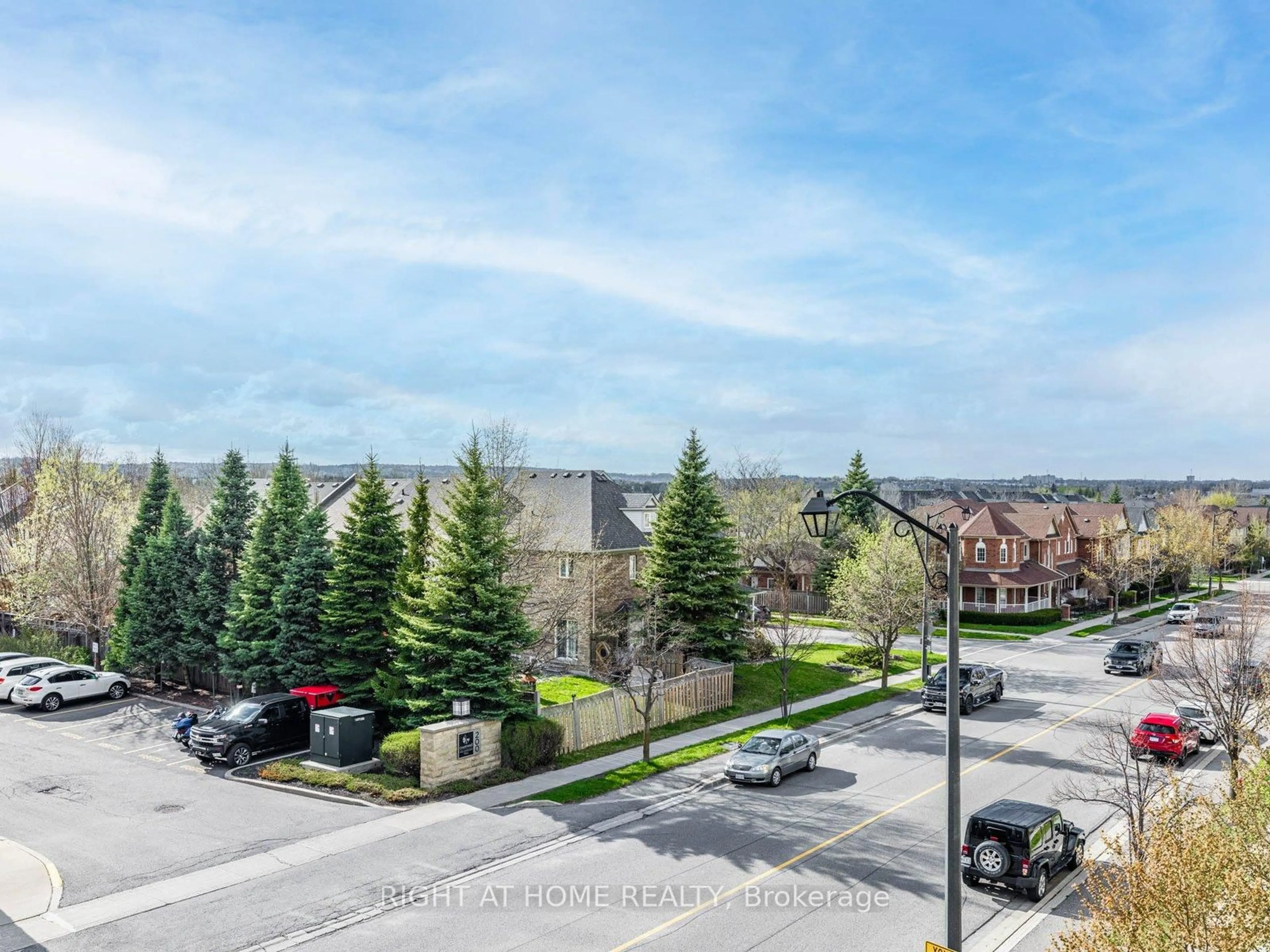 A pic from outside/outdoor area/front of a property/back of a property/a pic from drone, city buildings view from balcony for 111 Civic Square Gate #314, Aurora Ontario L4G 0S6
