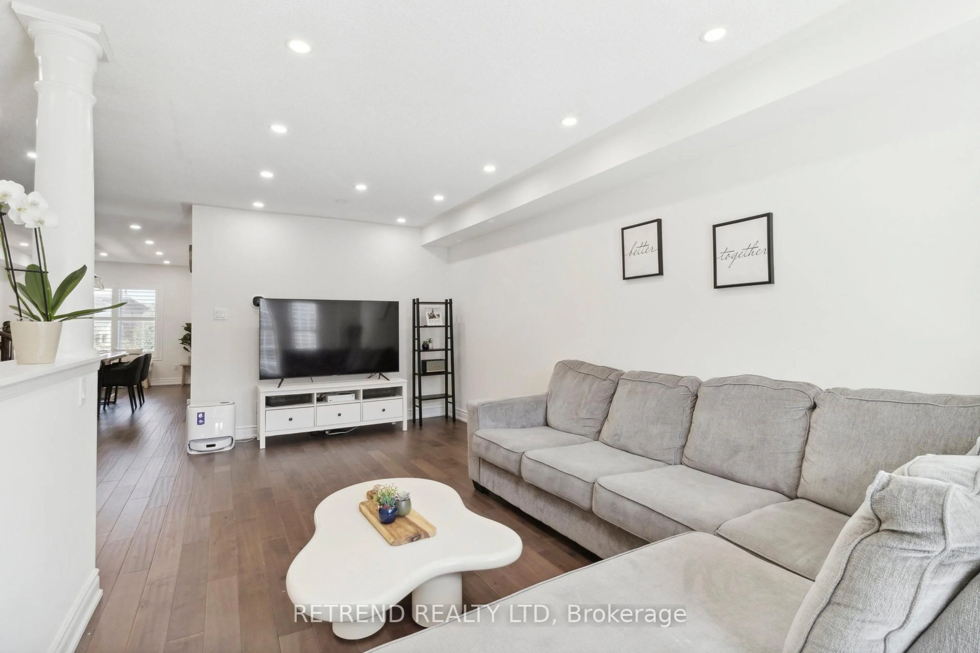 Living room with furniture, wood/laminate floor for 20 Minton Dr #15, Vaughan Ontario L4L 9L6