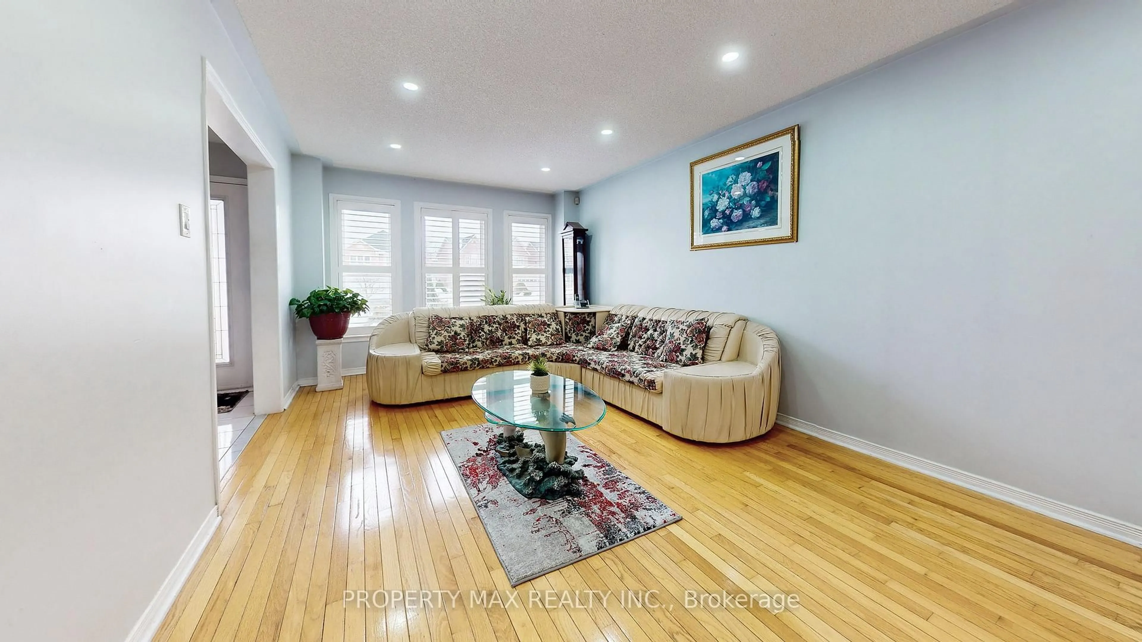 Living room with furniture, wood/laminate floor for 96 Gillingham Ave, Markham Ontario L3S 3R6