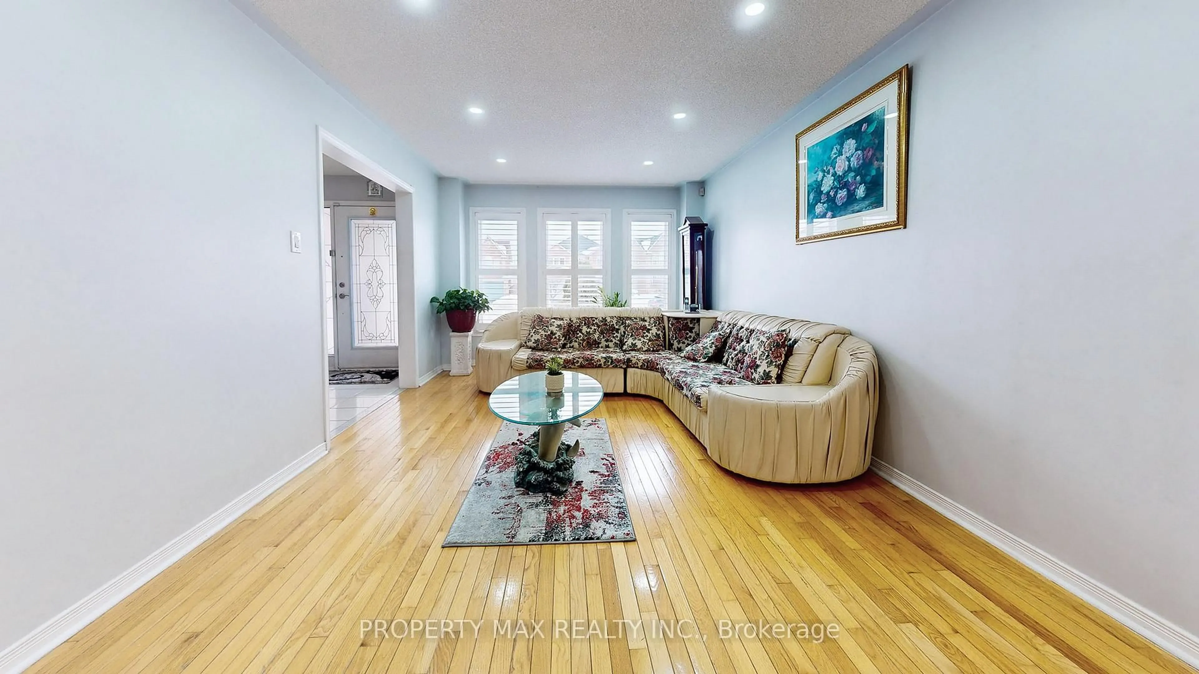 Living room with furniture, wood/laminate floor for 96 Gillingham Ave, Markham Ontario L3S 3R6