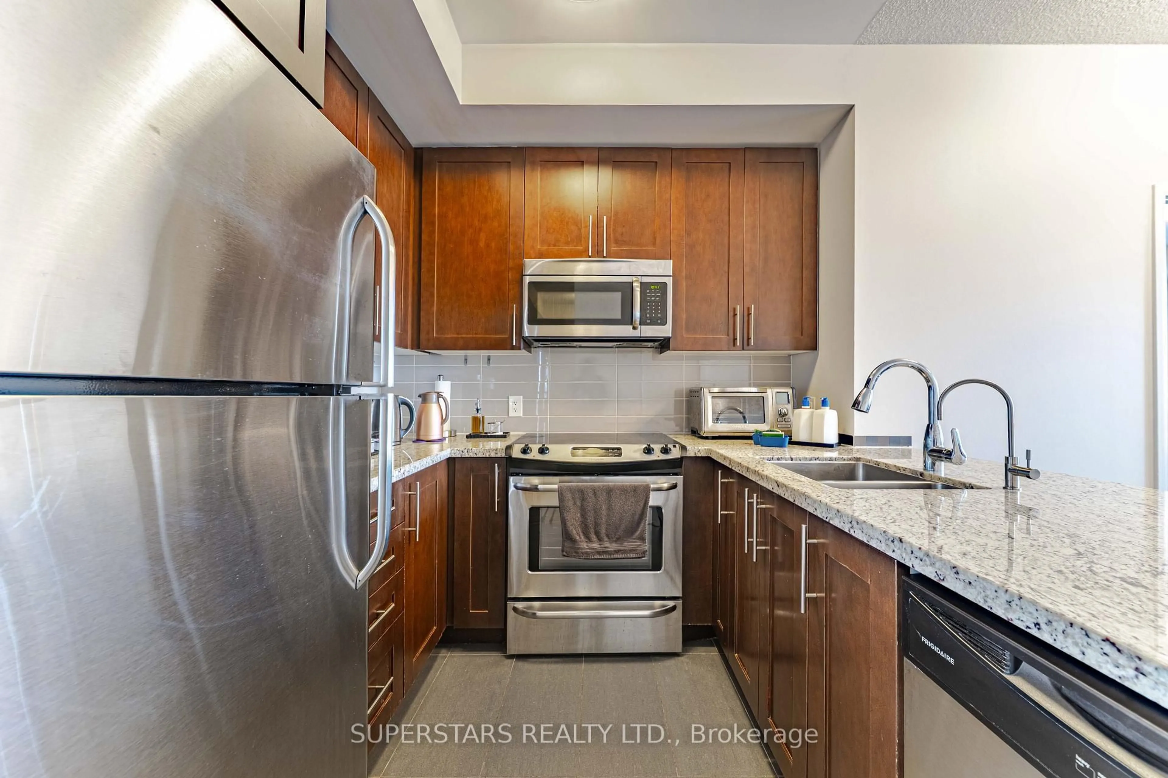 Standard kitchen, ceramic/tile floor for 540 Bur Oak Ave #223, Markham Ontario L6C 0Y2