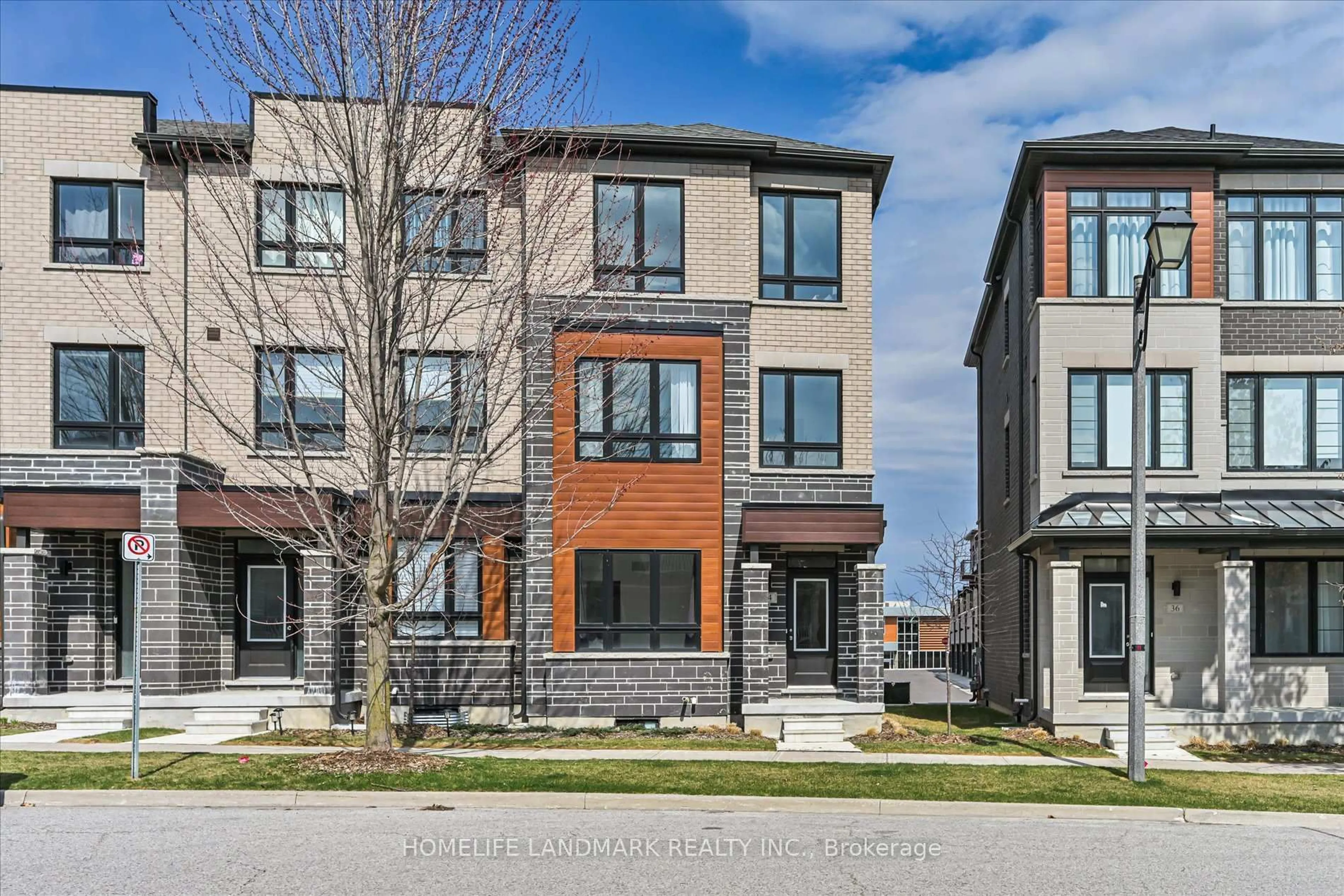 Home with brick exterior material, street for 34 Carole Bell Way, Markham Ontario L6E 0W2