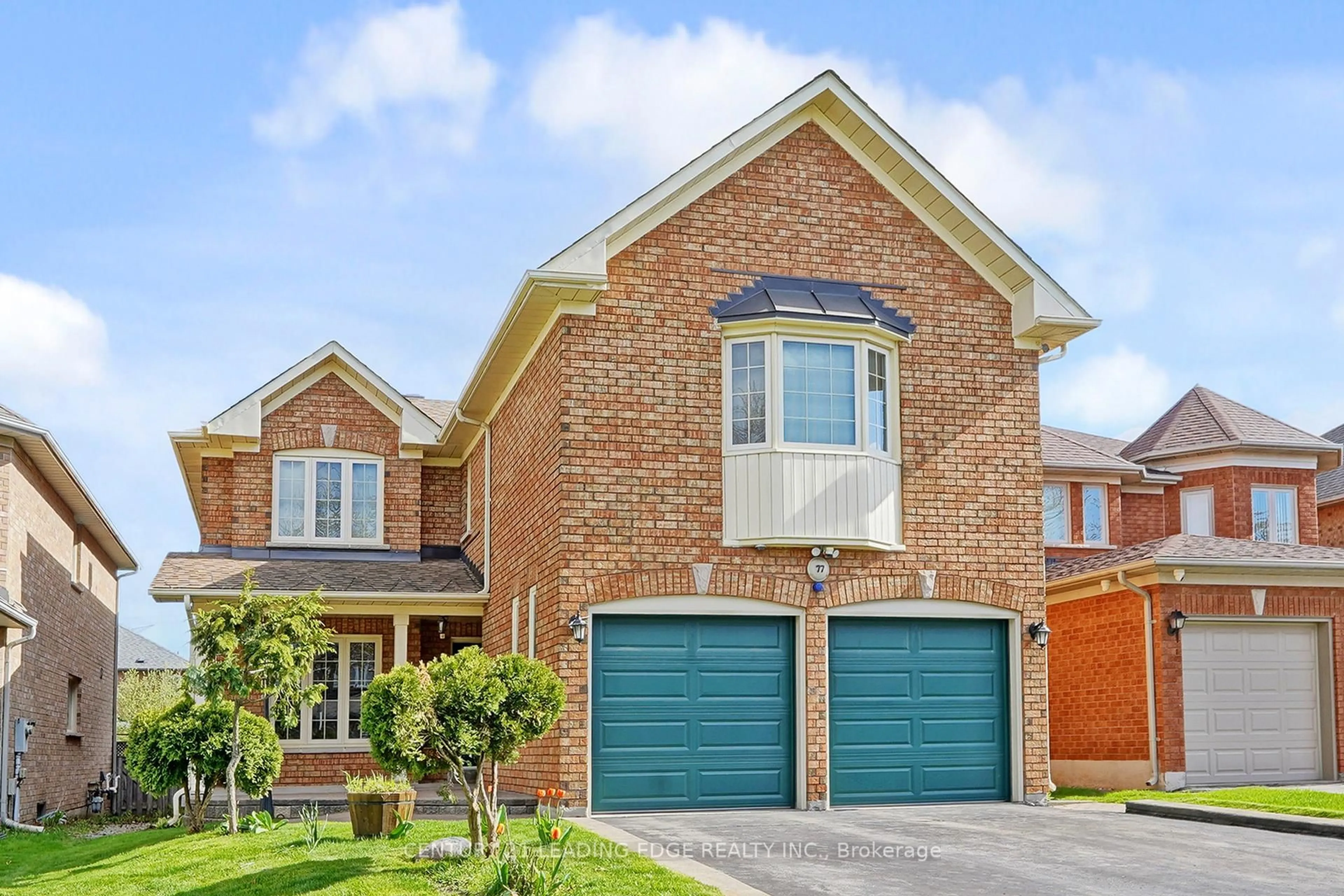 Home with brick exterior material, street for 77 Song Bird Dr, Markham Ontario L3S 3T8