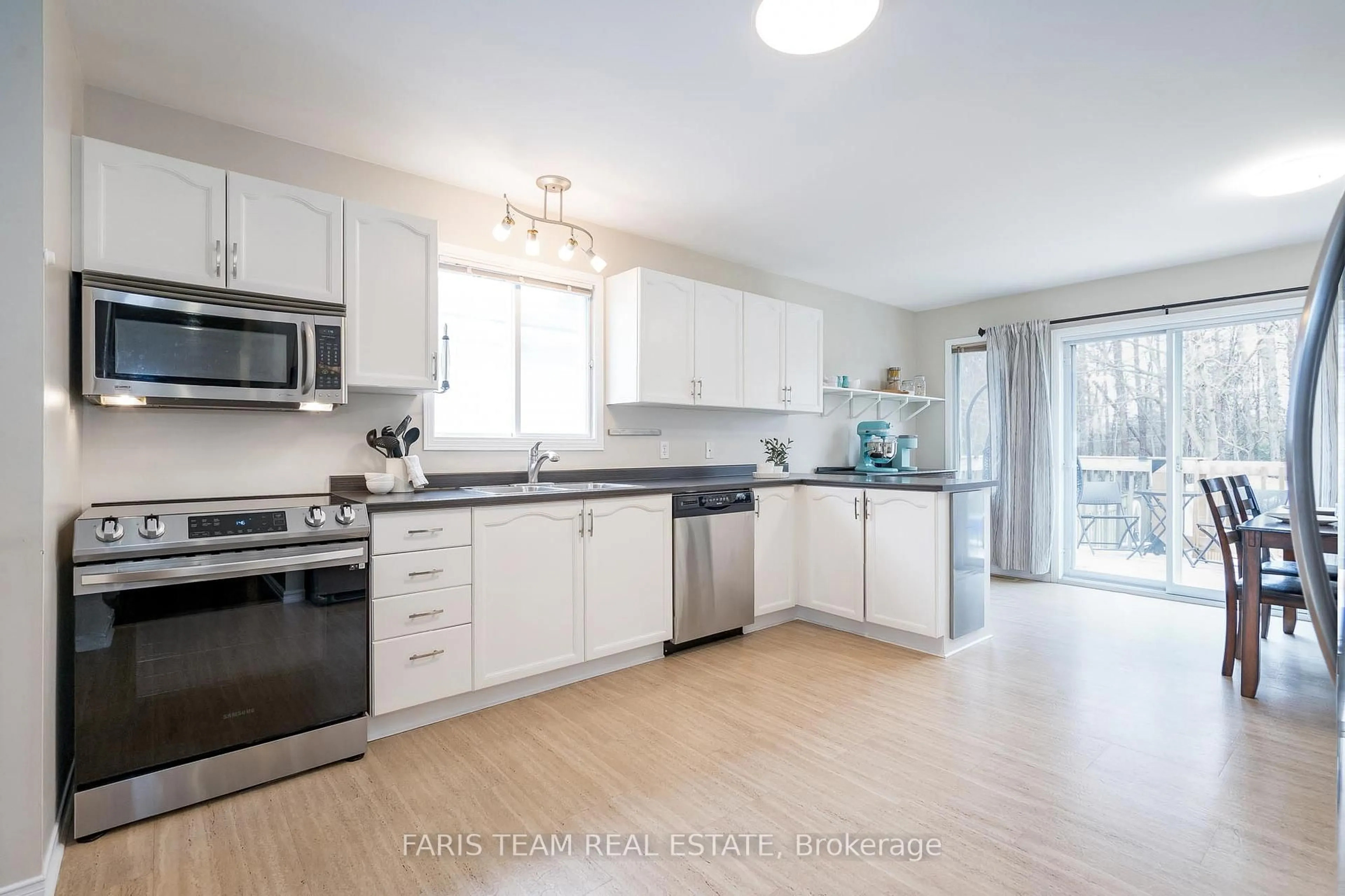 Open concept kitchen, unknown for 63 Osborn St, Essa Ontario L0M 1B0