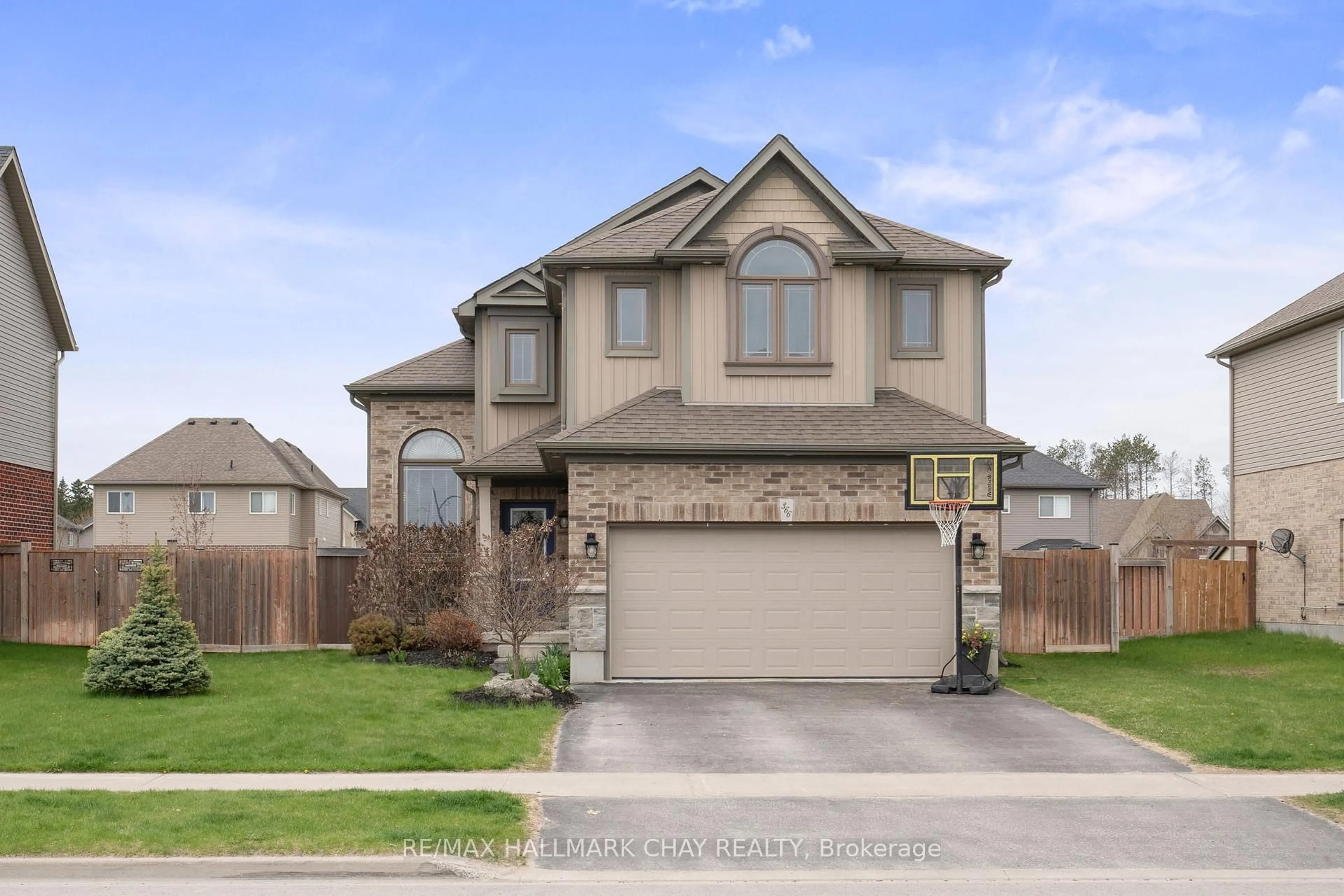 Home with brick exterior material, street for 366 Greenwood Dr, Essa Ontario L0M 1B6