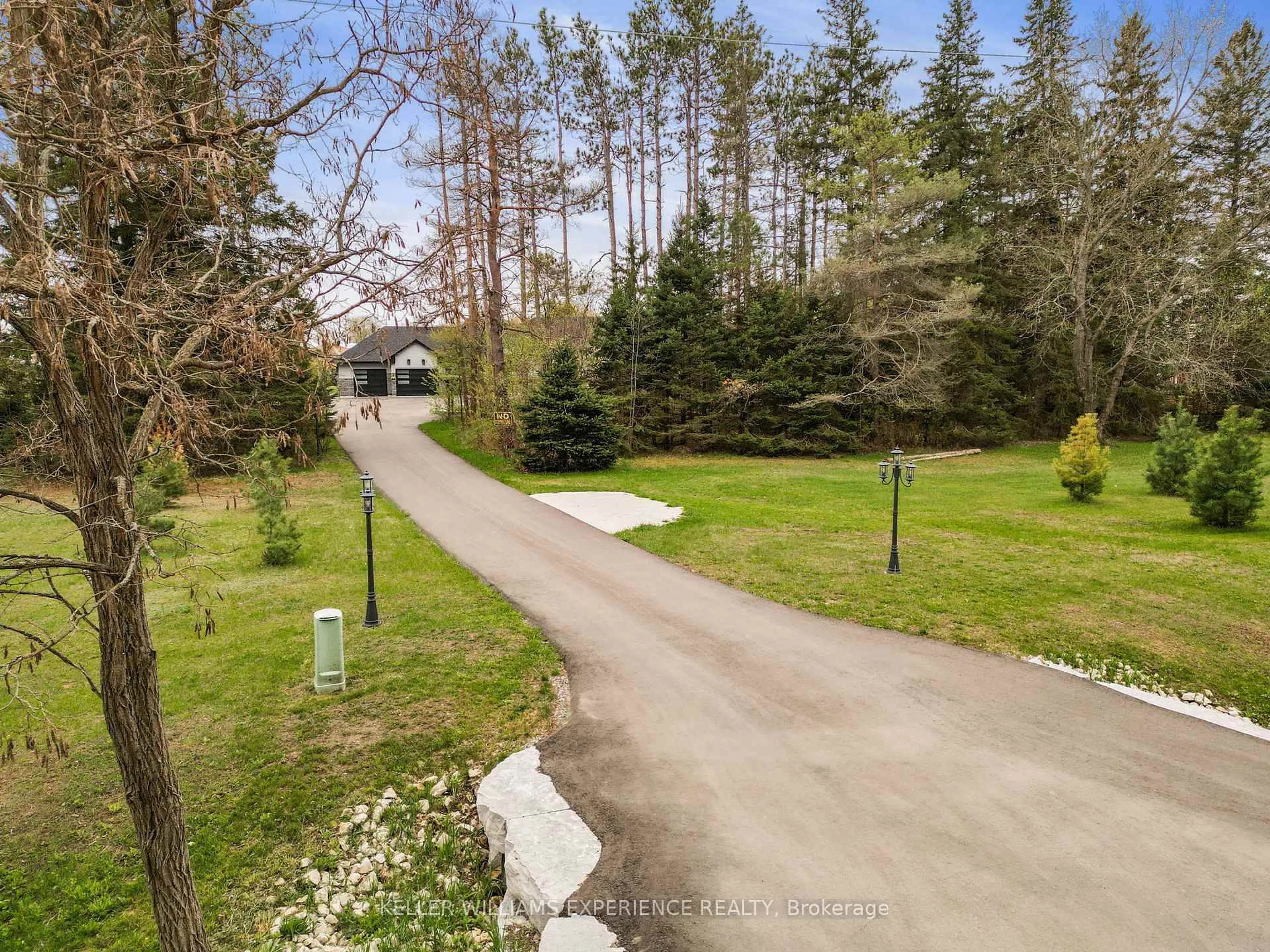 A pic from outside/outdoor area/front of a property/back of a property/a pic from drone, forest/trees view for 7028 Pine Plains Rd, Adjala-Tosorontio Ontario L0M 1J0