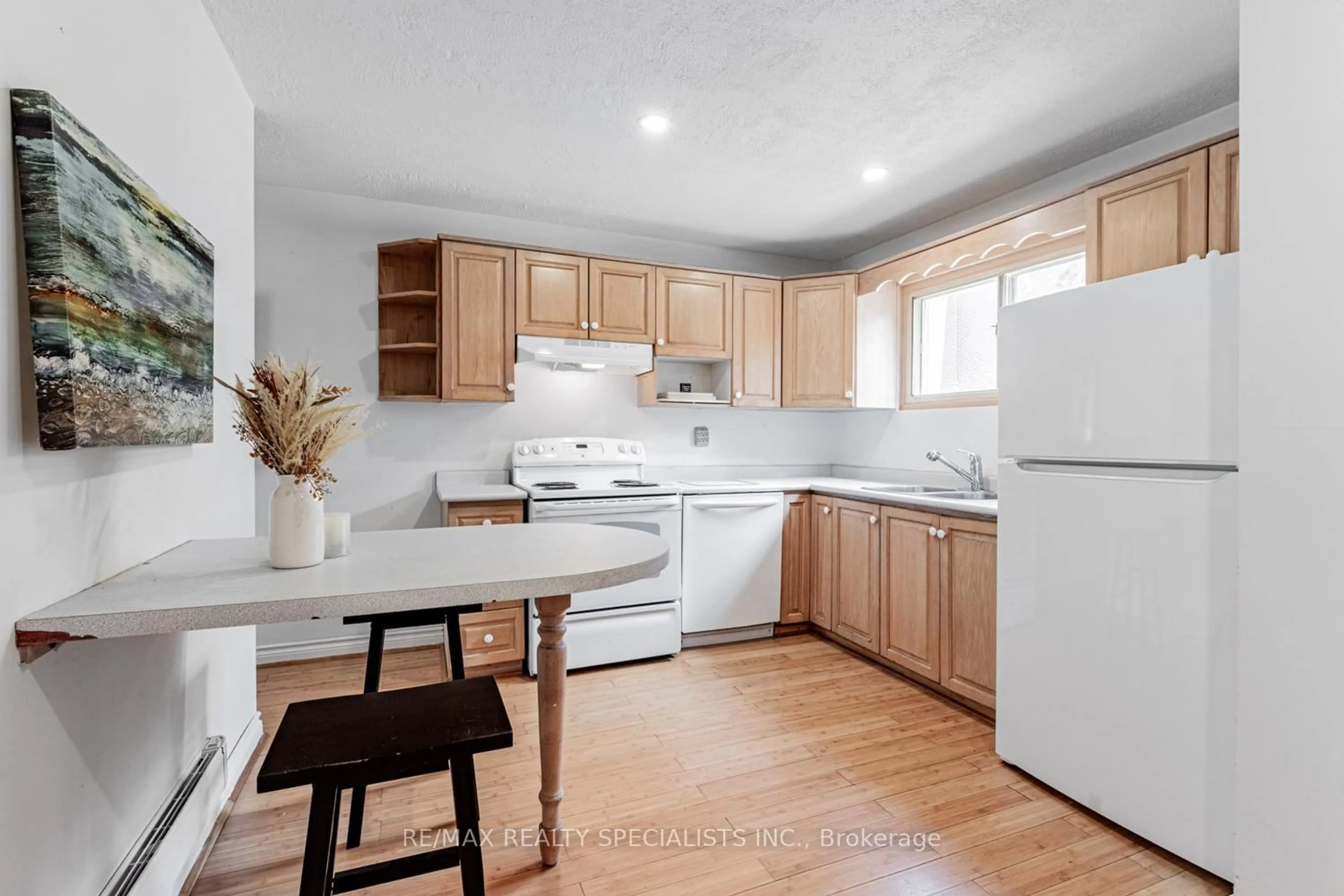 Standard kitchen, wood/laminate floor for 116 Wales Ave, Markham Ontario L3P 3K2