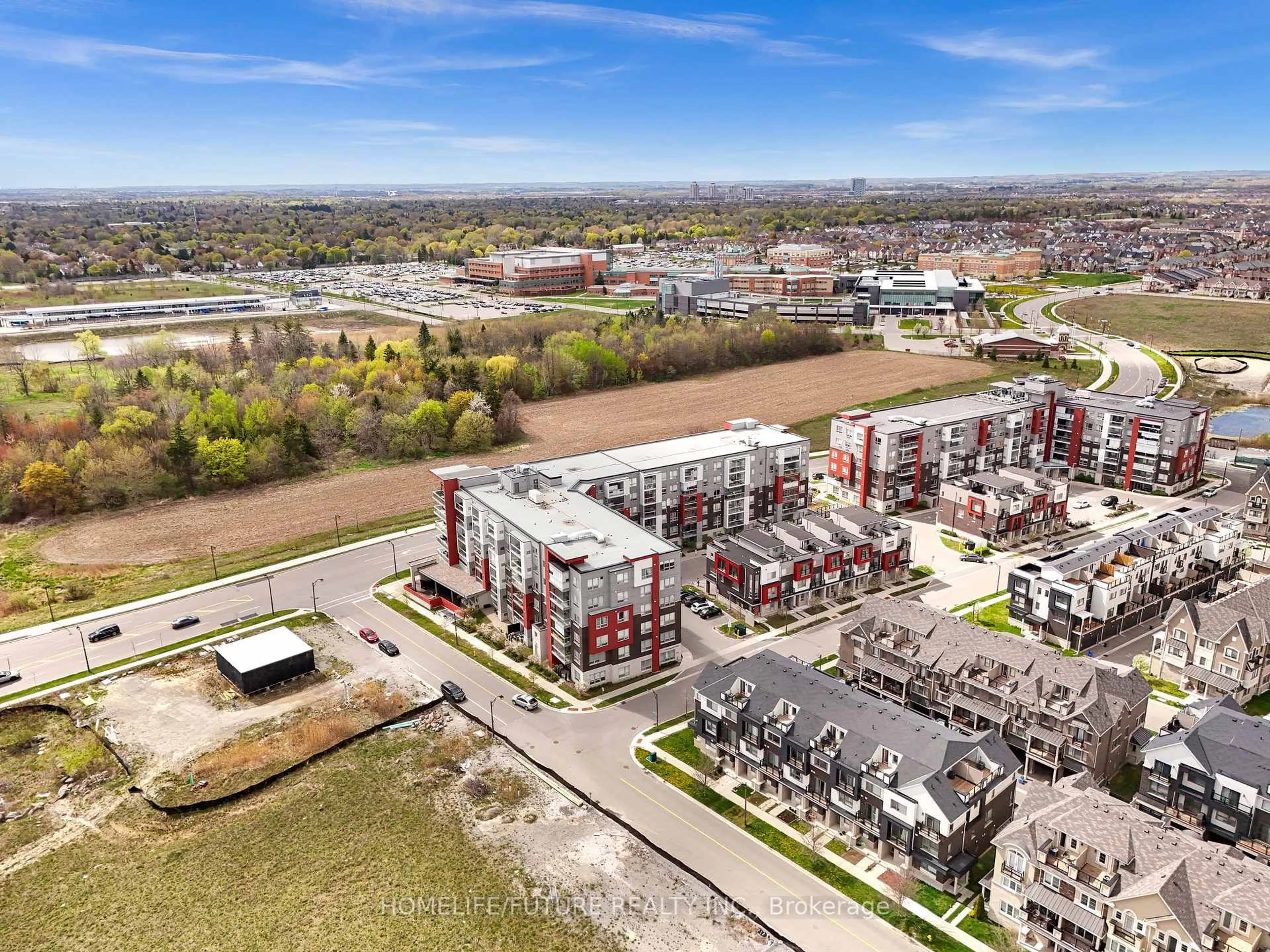 A pic from outside/outdoor area/front of a property/back of a property/a pic from drone, unknown for 2 Adam Sellers St #410, Markham Ontario L6B 1N2