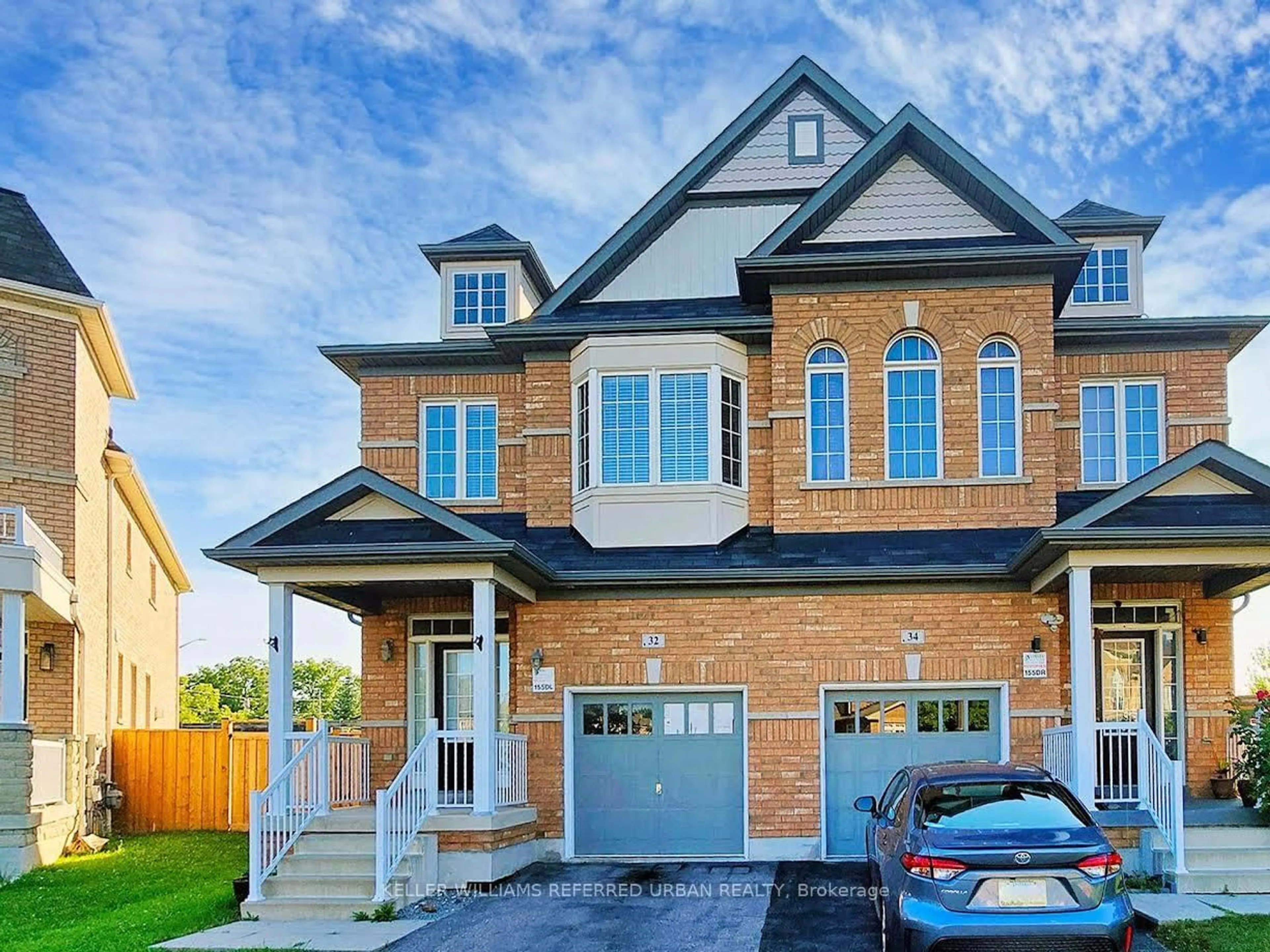 Home with brick exterior material, street for 32 Haskett Dr, Markham Ontario L6B 0S9