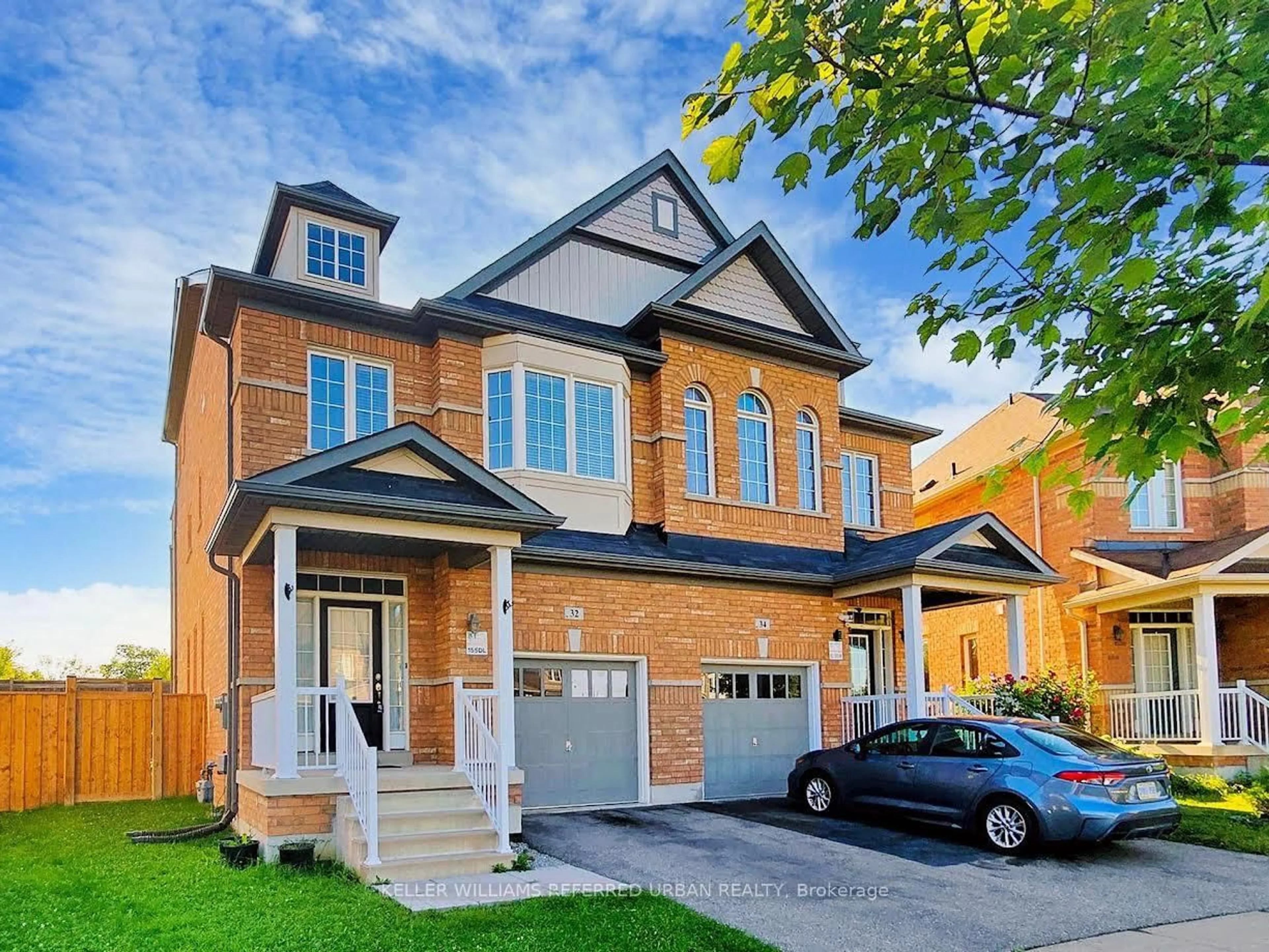 Home with brick exterior material, street for 32 Haskett Dr, Markham Ontario L6B 0S9