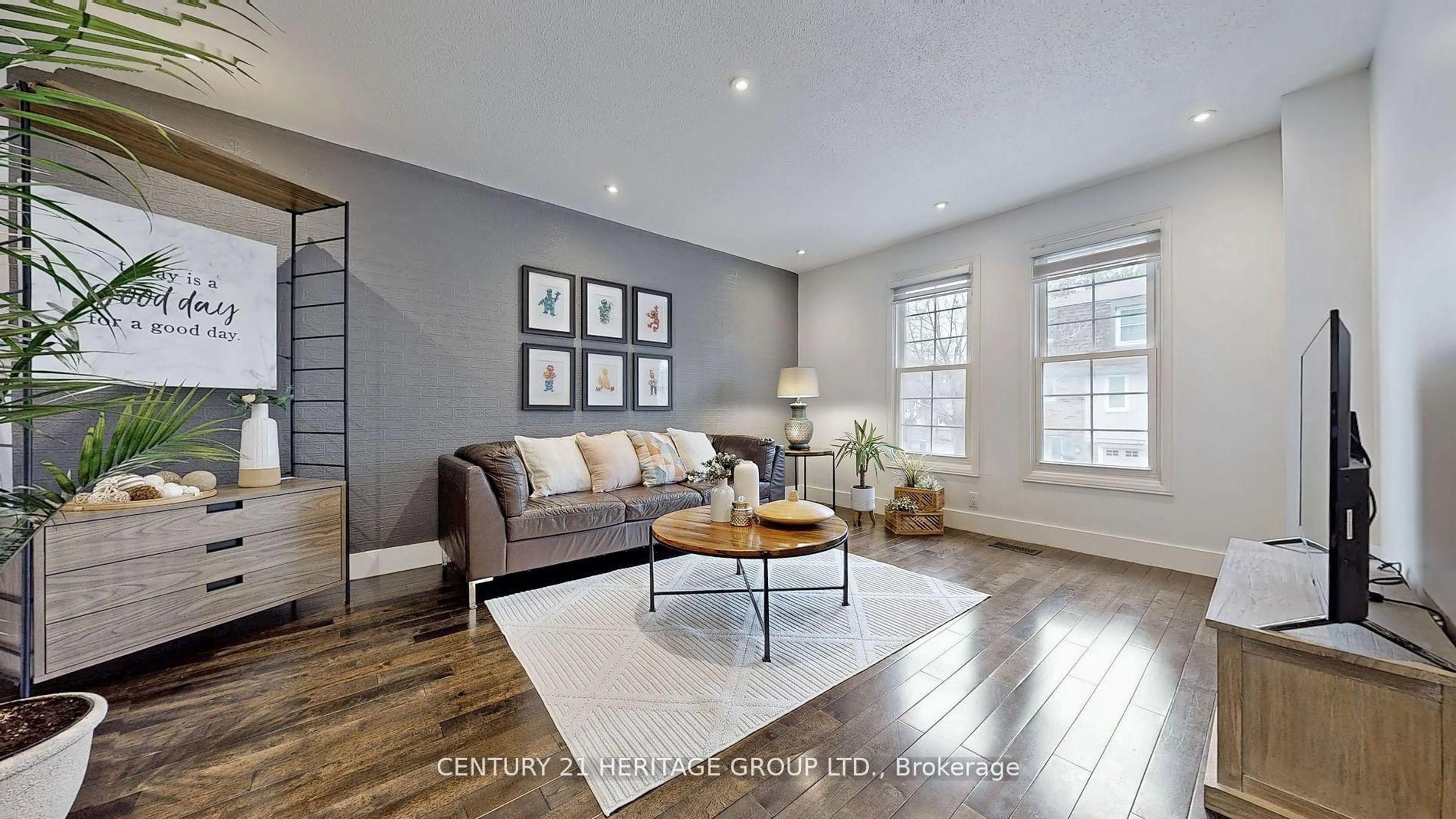 Living room with furniture, wood/laminate floor for 33 Bramble Way, Markham Ontario L3P 3V8