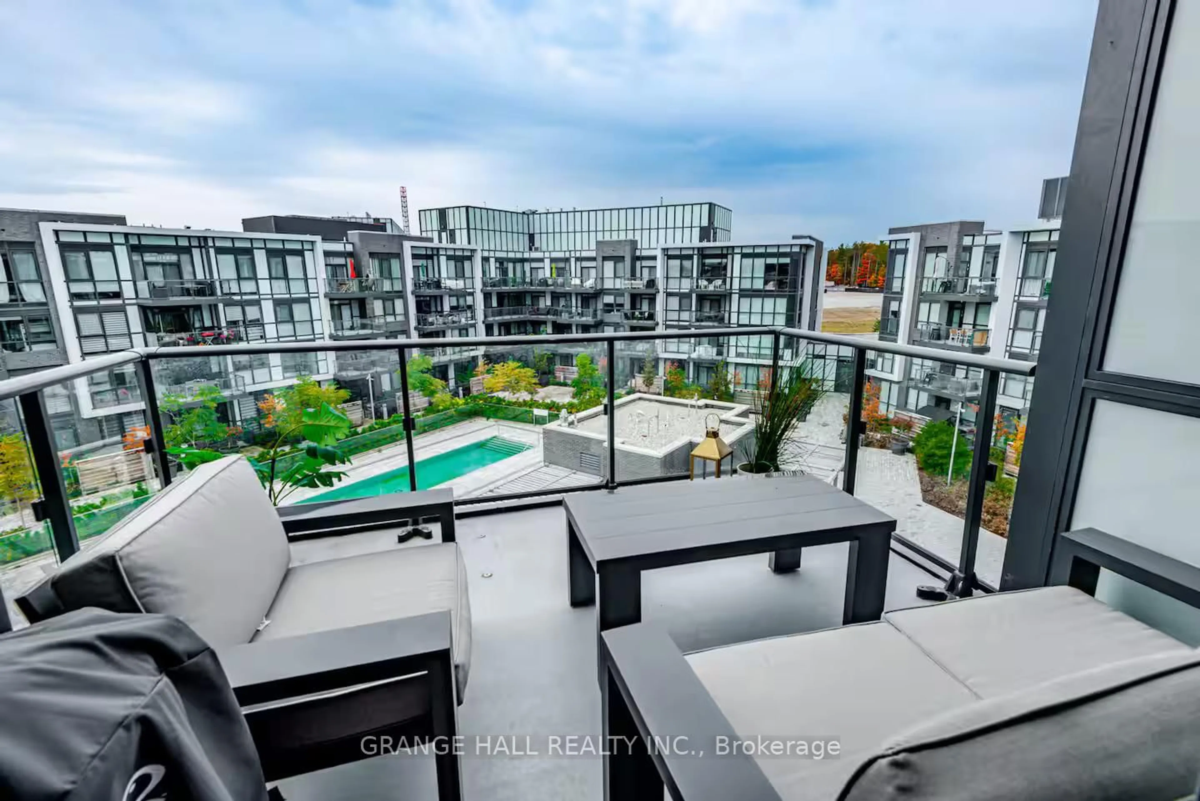 Patio, city buildings view from balcony for 375 Sea Ray Ave #420, Innisfil Ontario L9S 0N9