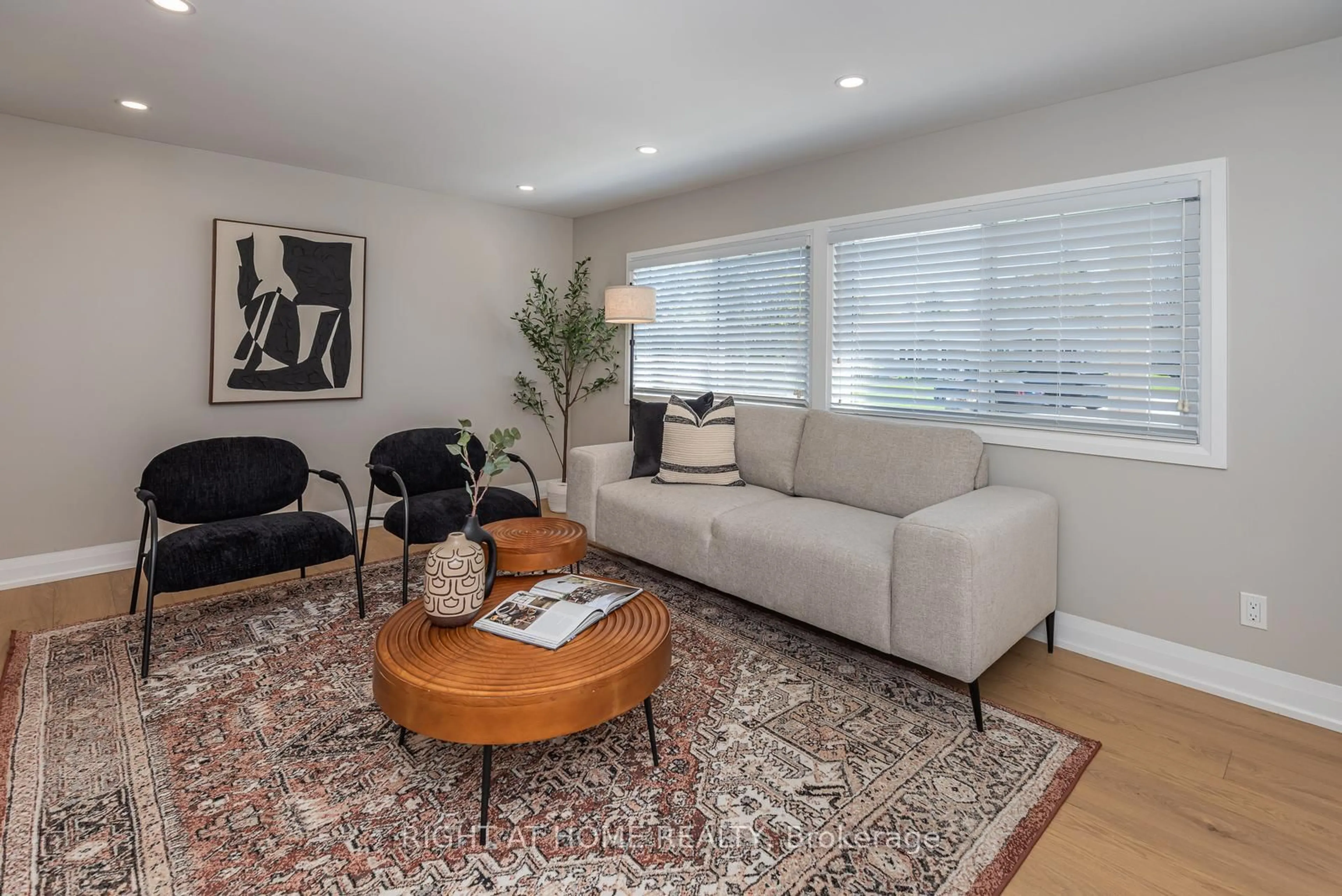Living room with furniture, unknown for 83 Hawthorne Dr, Innisfil Ontario L9S 1N9