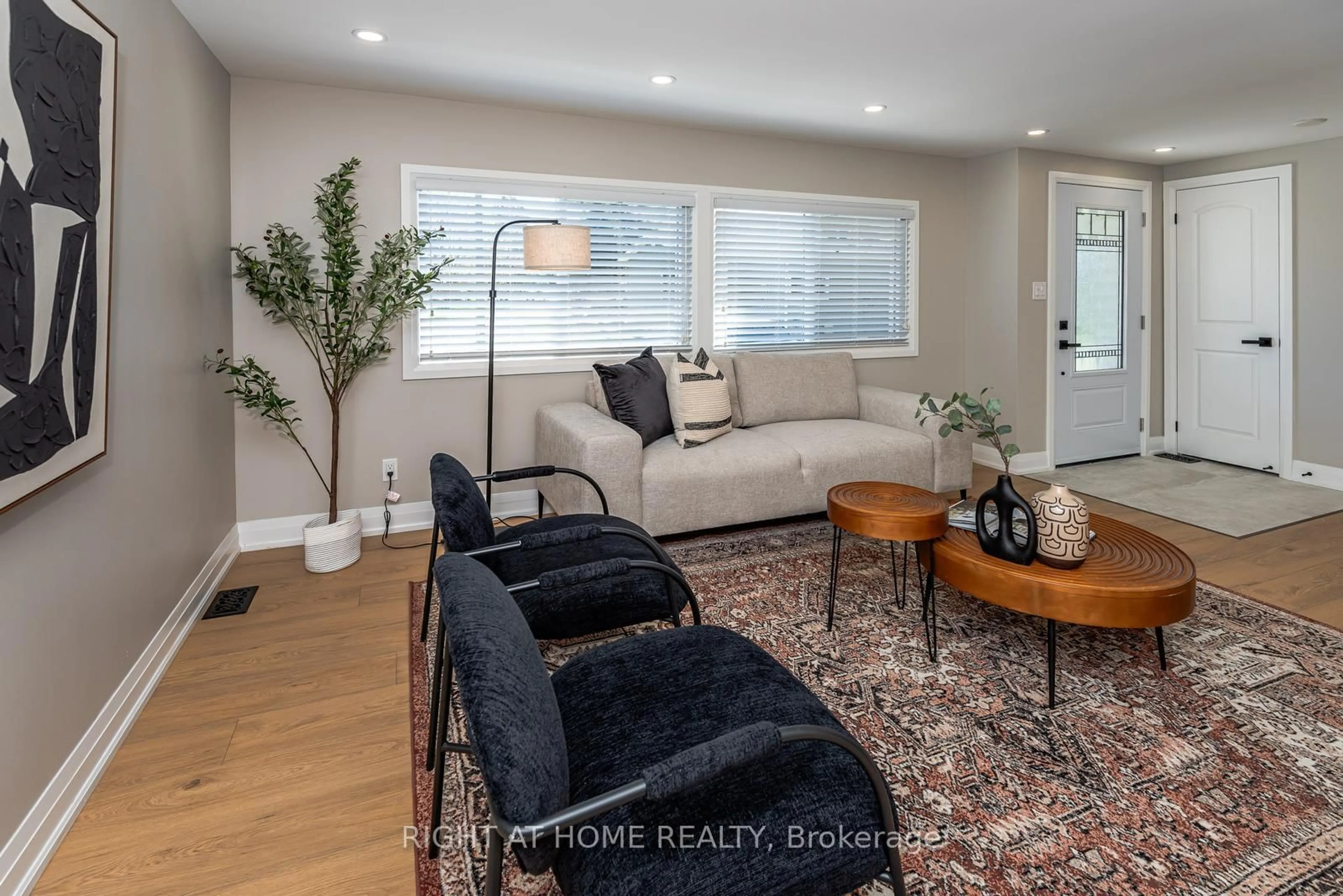 Living room with furniture, unknown for 83 Hawthorne Dr, Innisfil Ontario L9S 1N9
