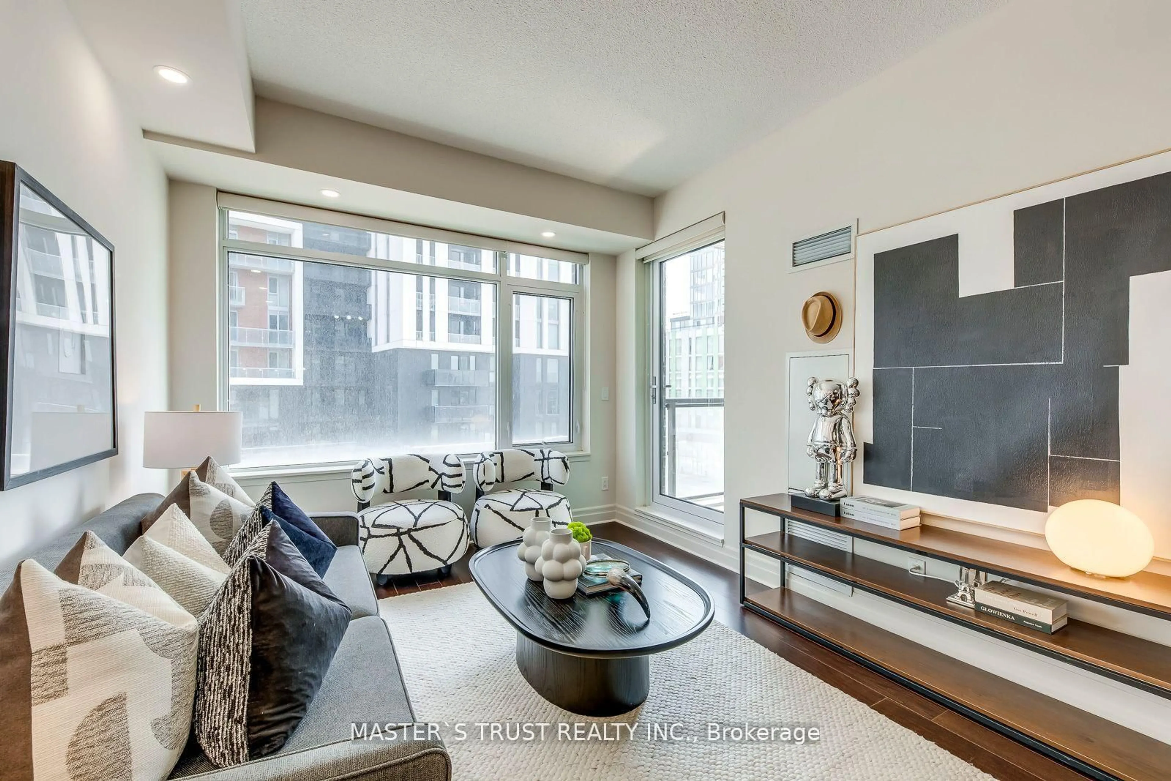 Living room with furniture, wood/laminate floor for 8110 Birchmount Rd #513, Markham Ontario L6G 0E3