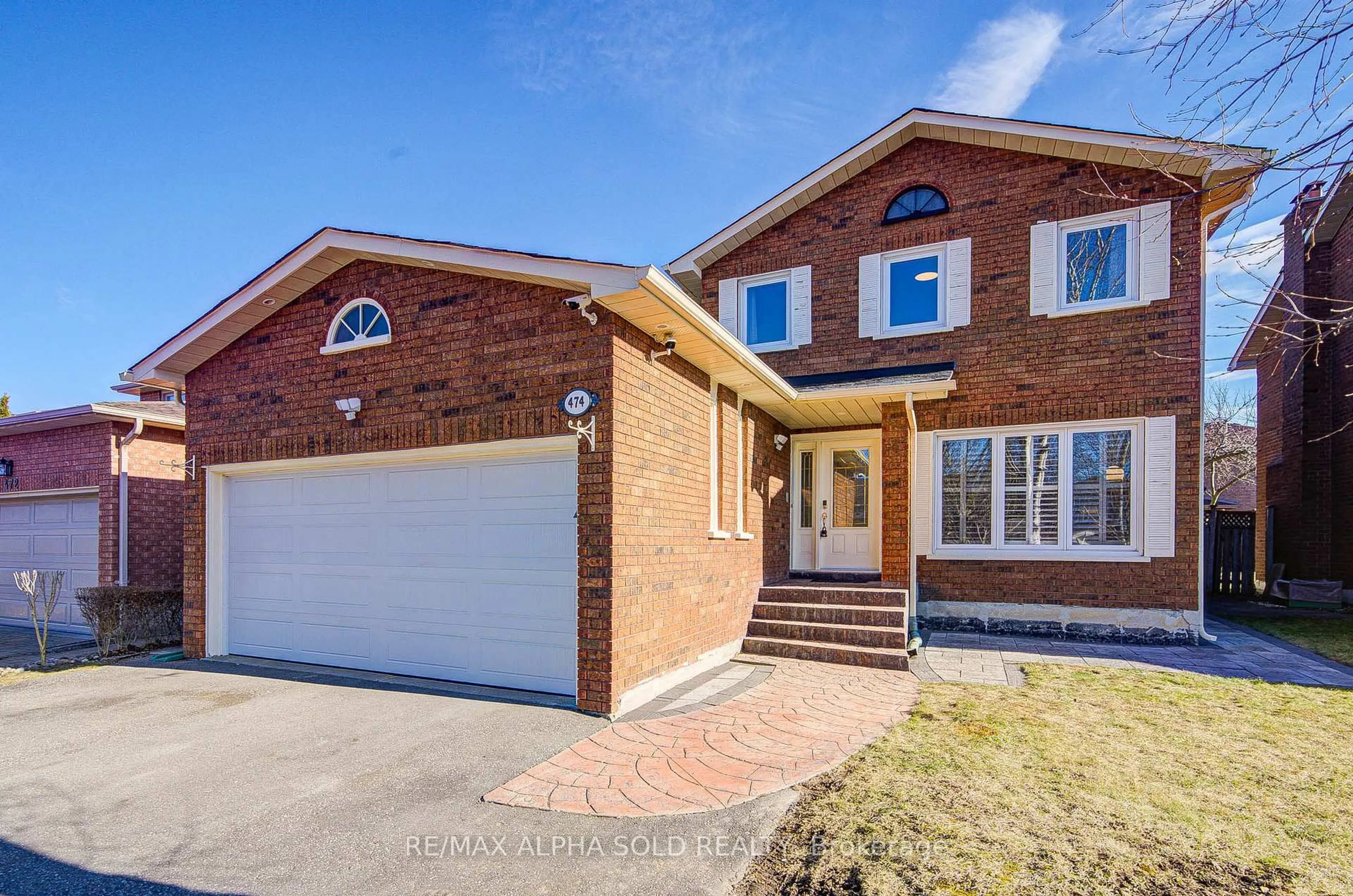 Home with brick exterior material, street for 474 Raymerville Dr, Markham Ontario L3P 6J1