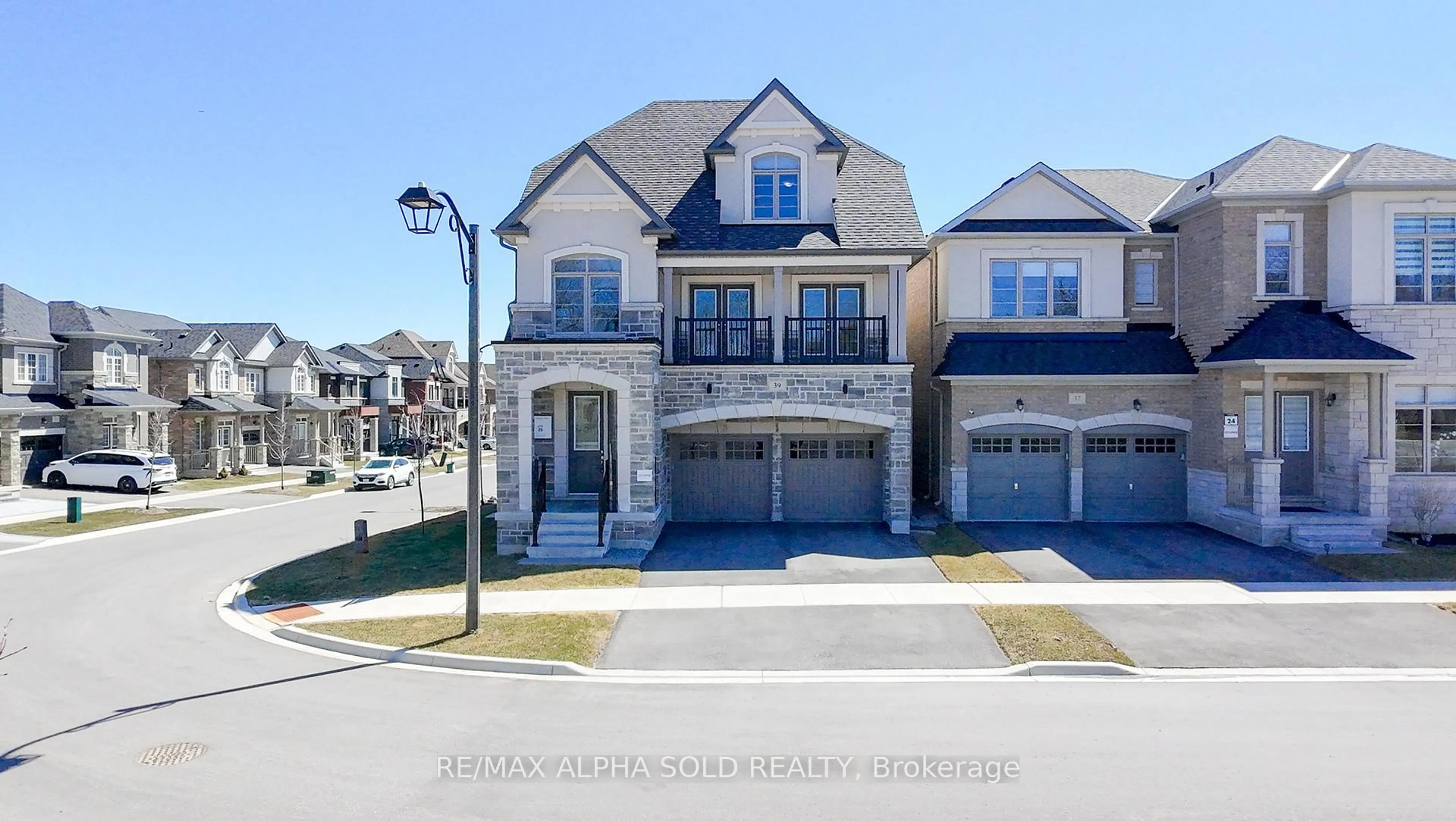 Home with brick exterior material, street for 39 Crofting Cres, Markham Ontario L6E 0W1
