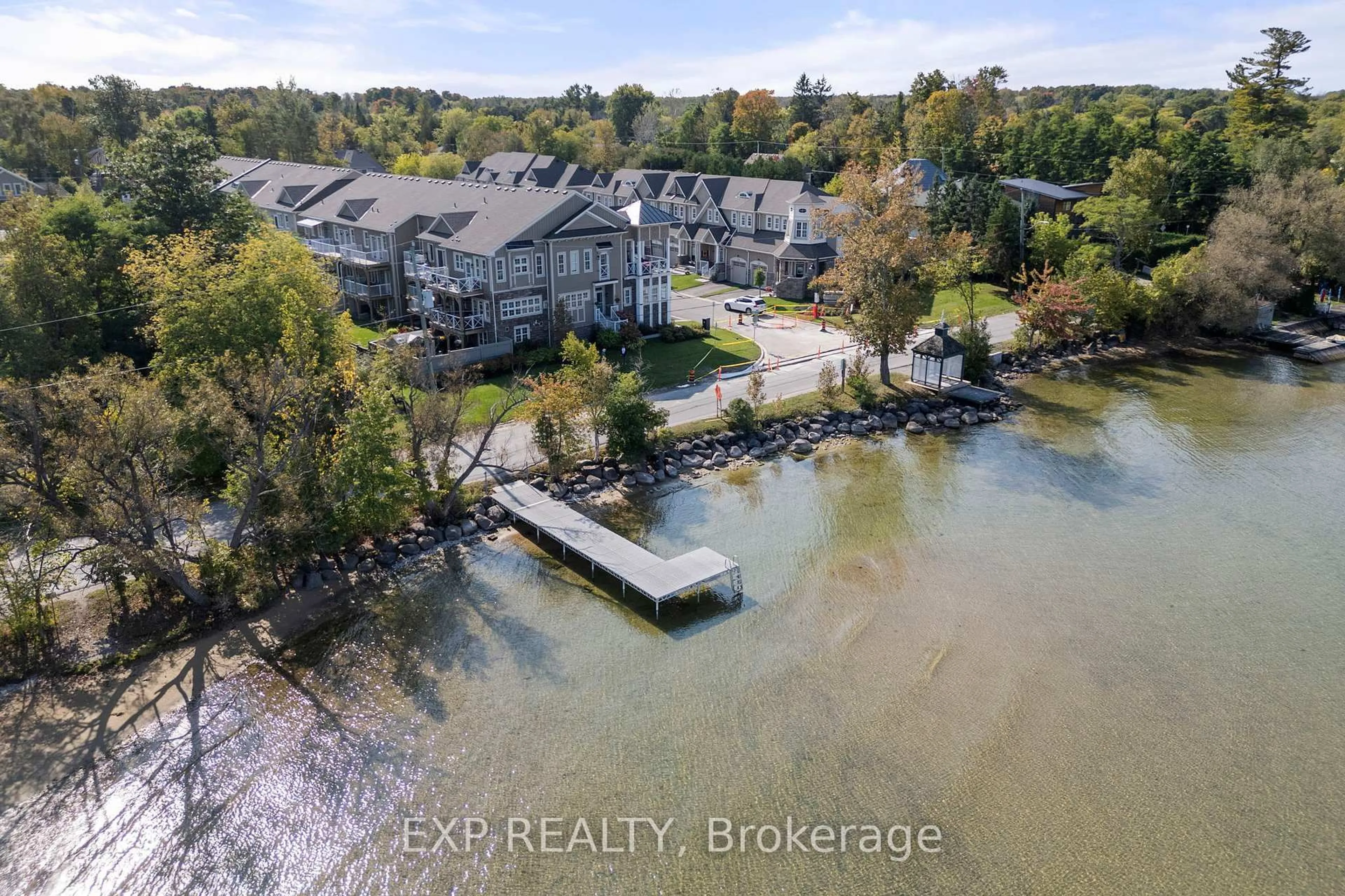 A pic from outside/outdoor area/front of a property/back of a property/a pic from drone, water/lake/river/ocean view for 57 Courting House Pl, Georgina Ontario L0E 1L0