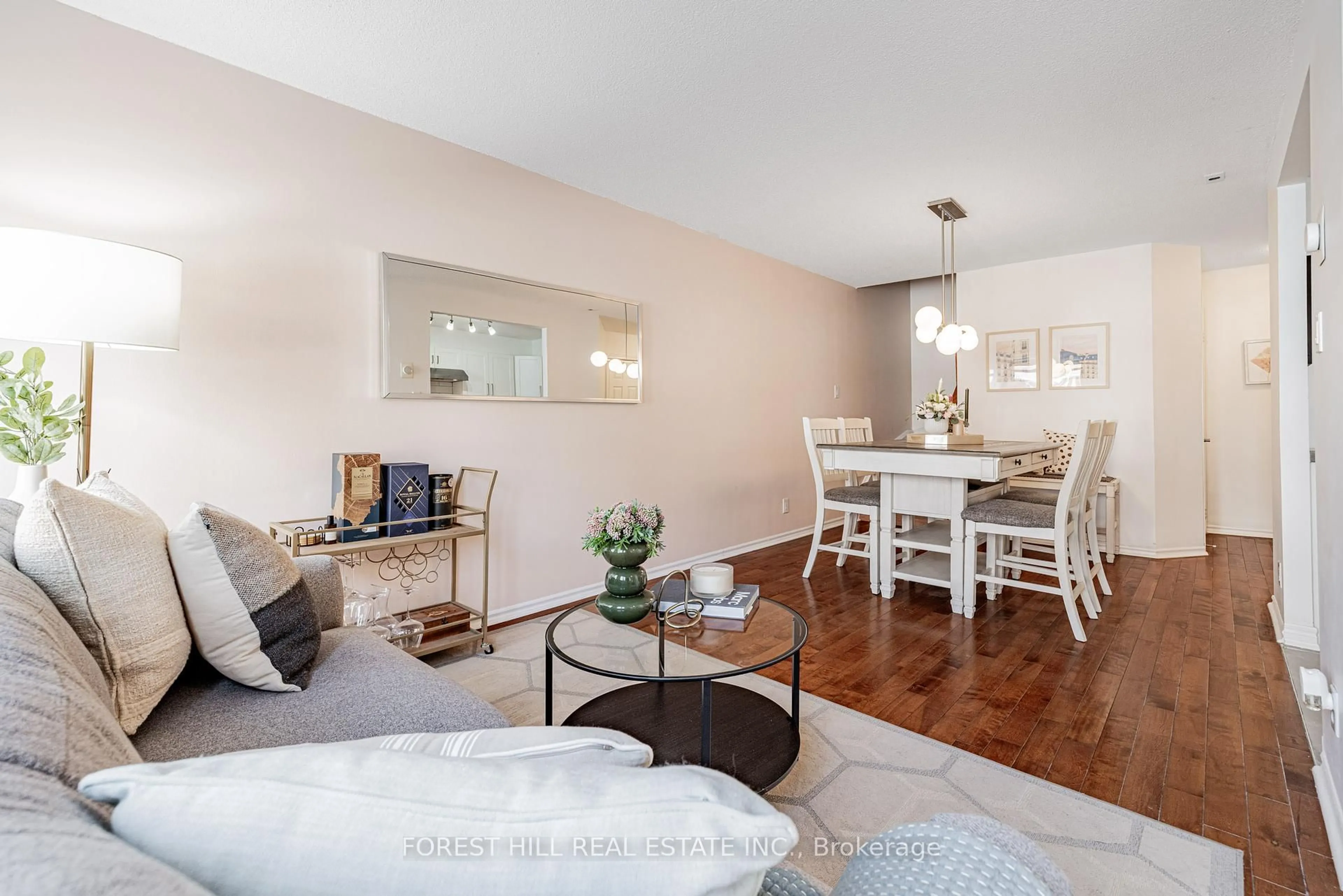 Living room with furniture, wood/laminate floor for 151 Townsgate Dr #95, Vaughan Ontario L4J 8J7