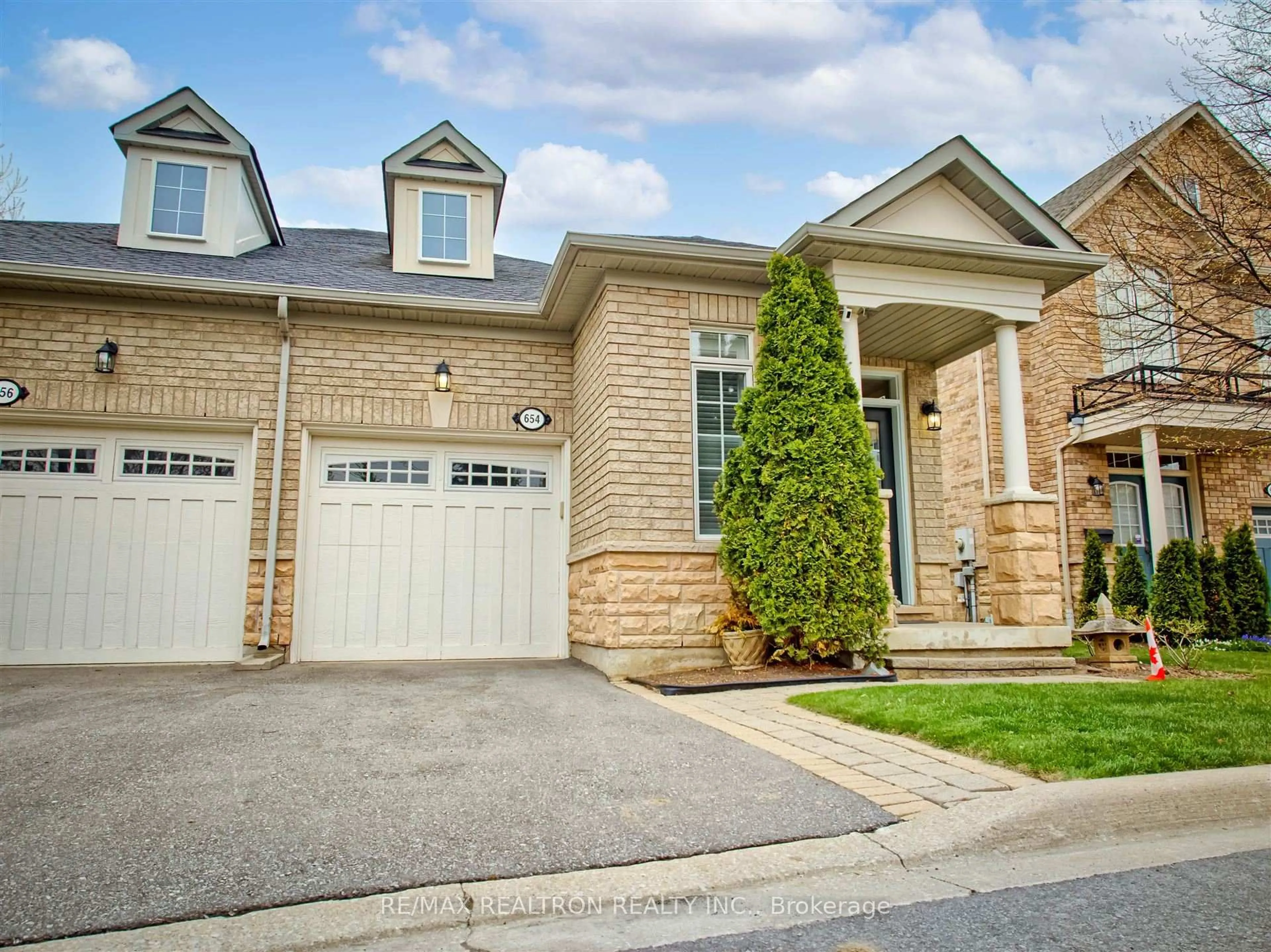 Home with brick exterior material, street for 654 Tapestry Lane, Newmarket Ontario L3X 3C8