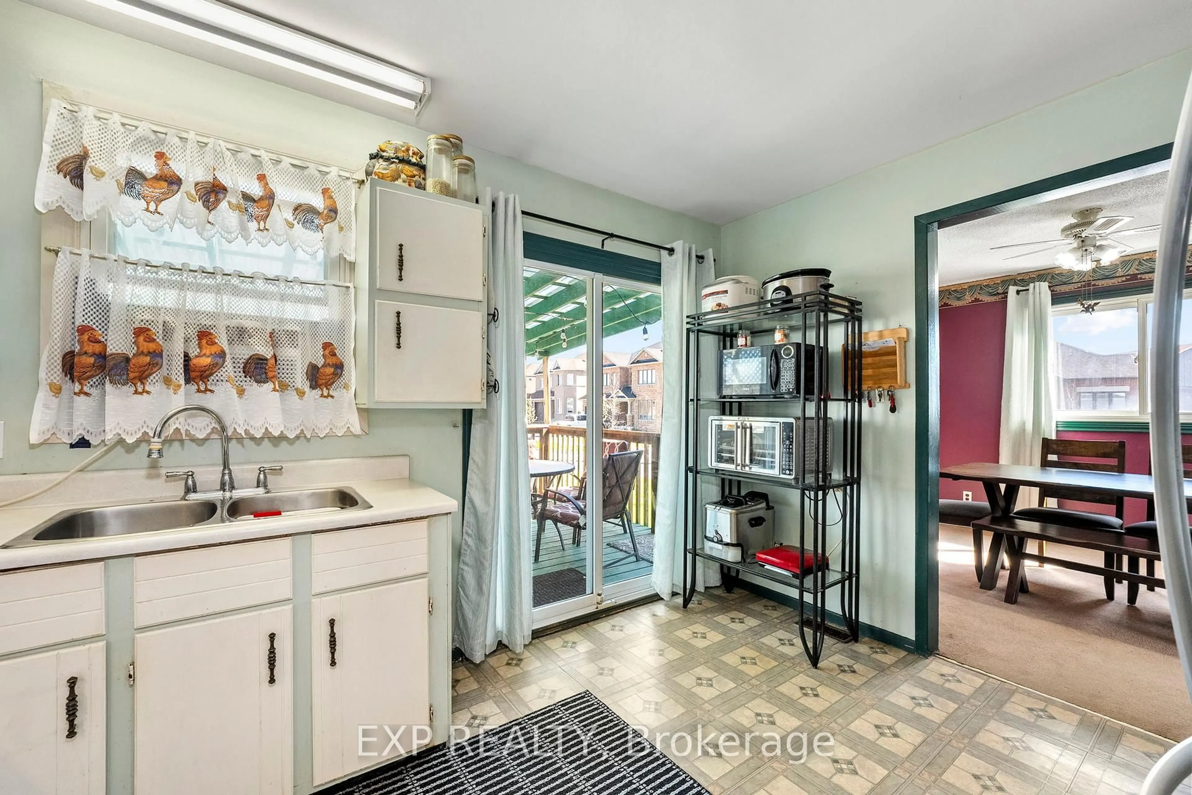 Kitchen with laundary machines, ceramic/tile floor for 354 Lakeland Cres, Brock Ontario L0K 1A0