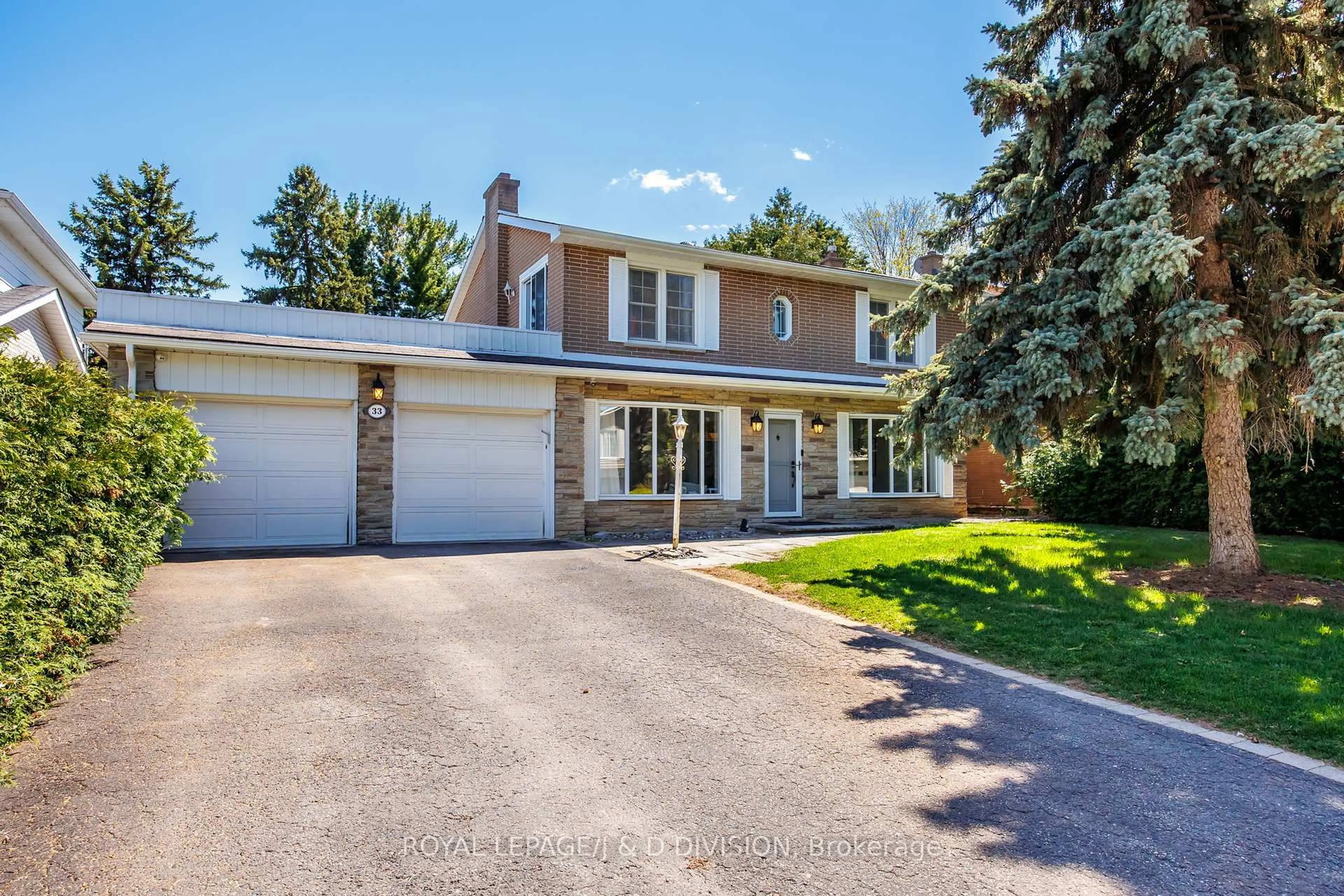 Home with brick exterior material, street for 33 Almond Ave, Markham Ontario L3T 1K9