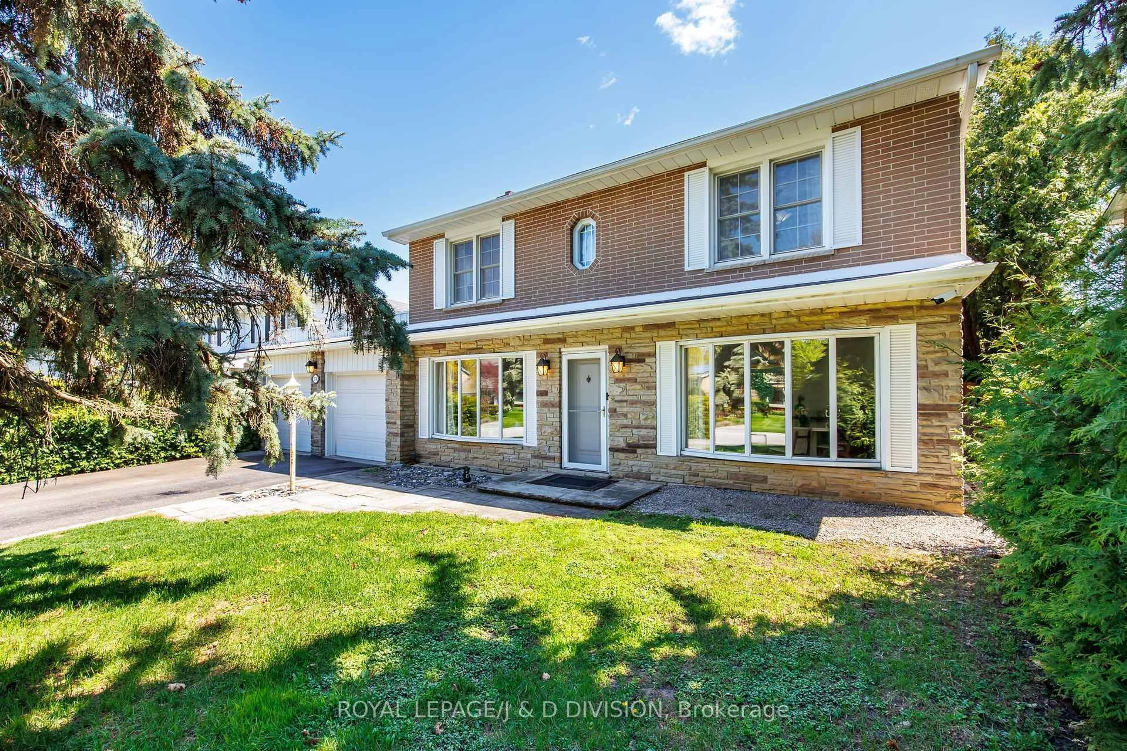 Home with brick exterior material, street for 33 Almond Ave, Markham Ontario L3T 1K9
