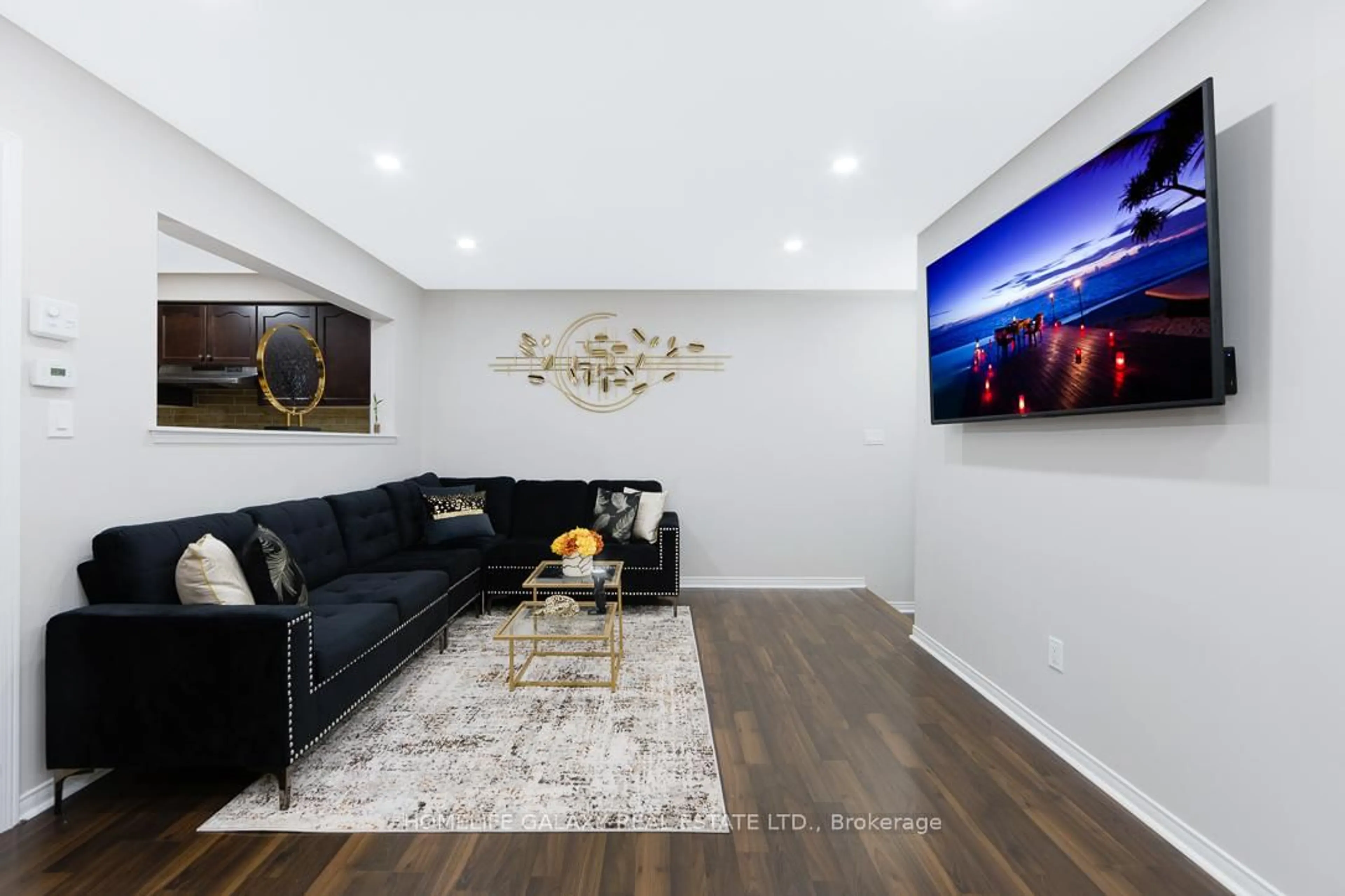Living room with furniture, wood/laminate floor for 120 Rutherford Rd, Bradford West Gwillimbury Ontario L3Z 0P6