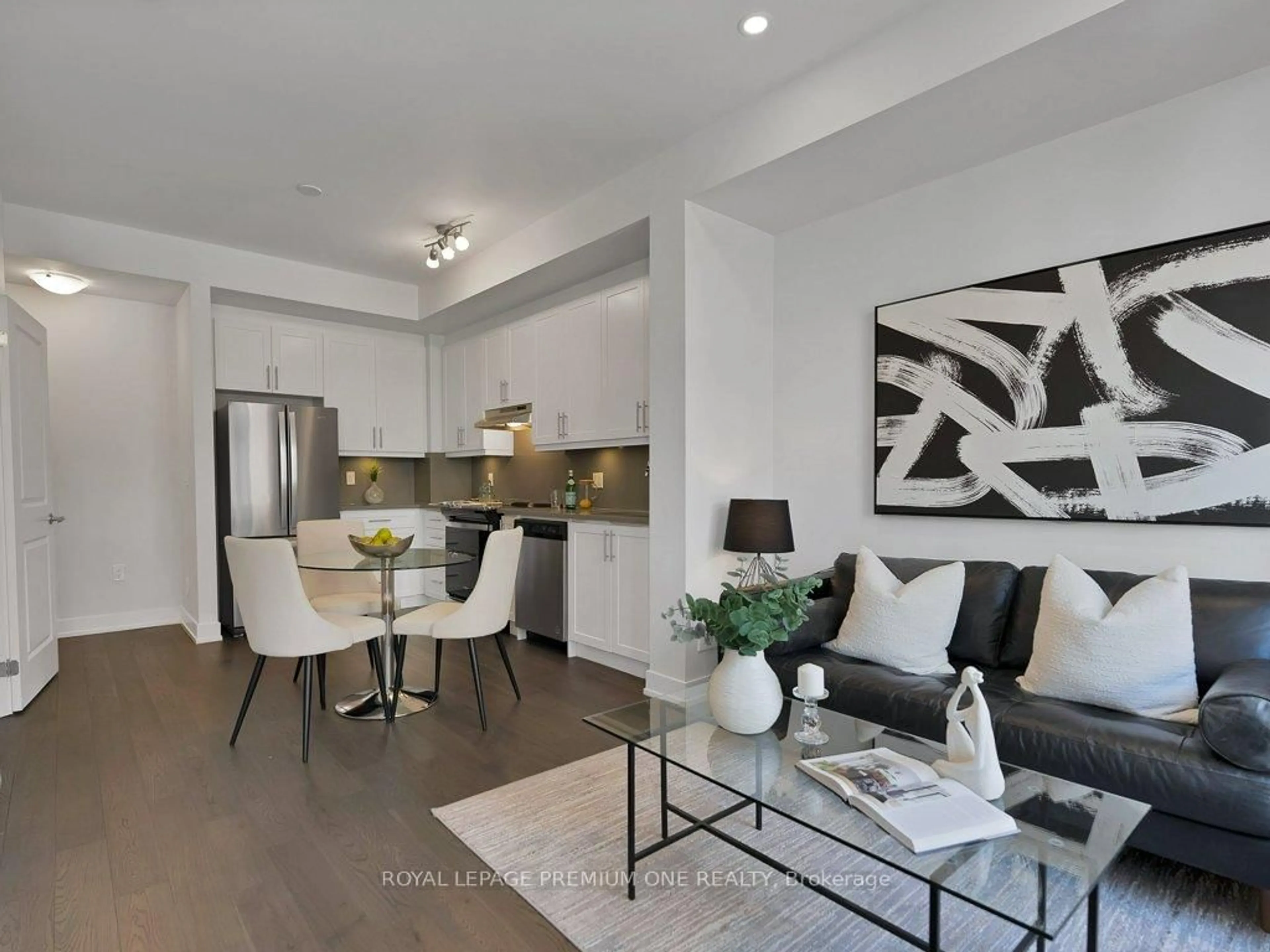 Living room with furniture, wood/laminate floor for 9570 Islington Ave #125, Vaughan Ontario L4L 1A7