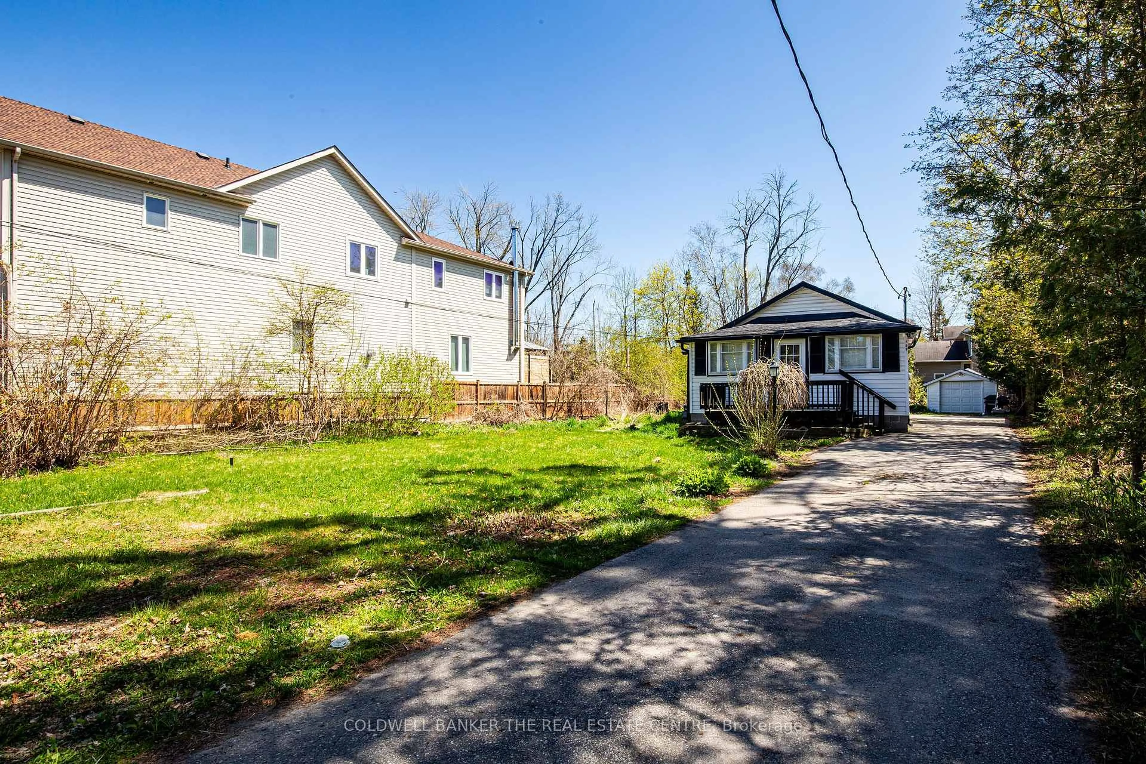 A pic from outside/outdoor area/front of a property/back of a property/a pic from drone, street for 721 9th Line, Innisfil Ontario L9S 3X9