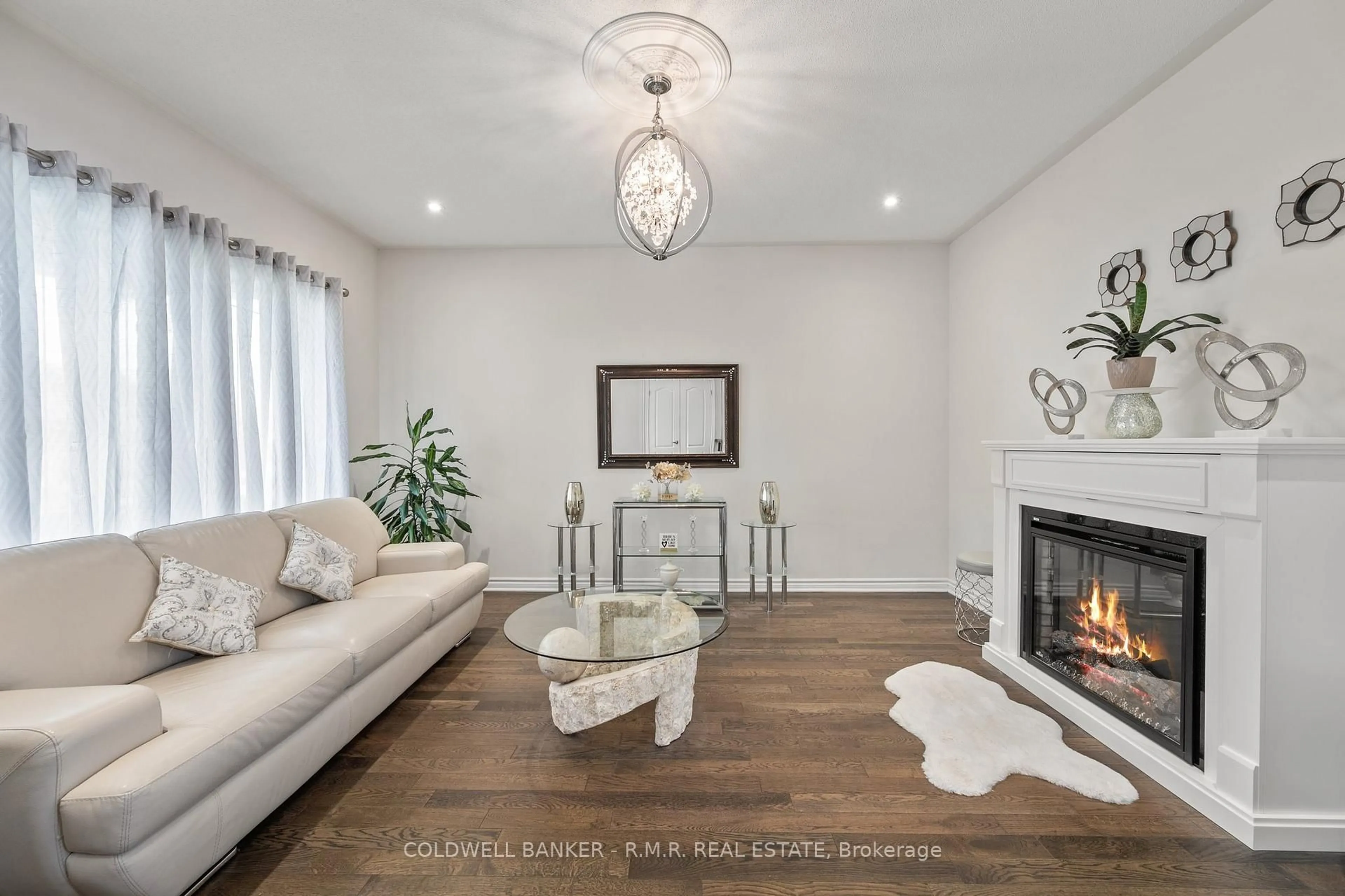Living room with furniture, wood/laminate floor for 132 Terry Clayton Ave, Brock Ontario L0K 1A0