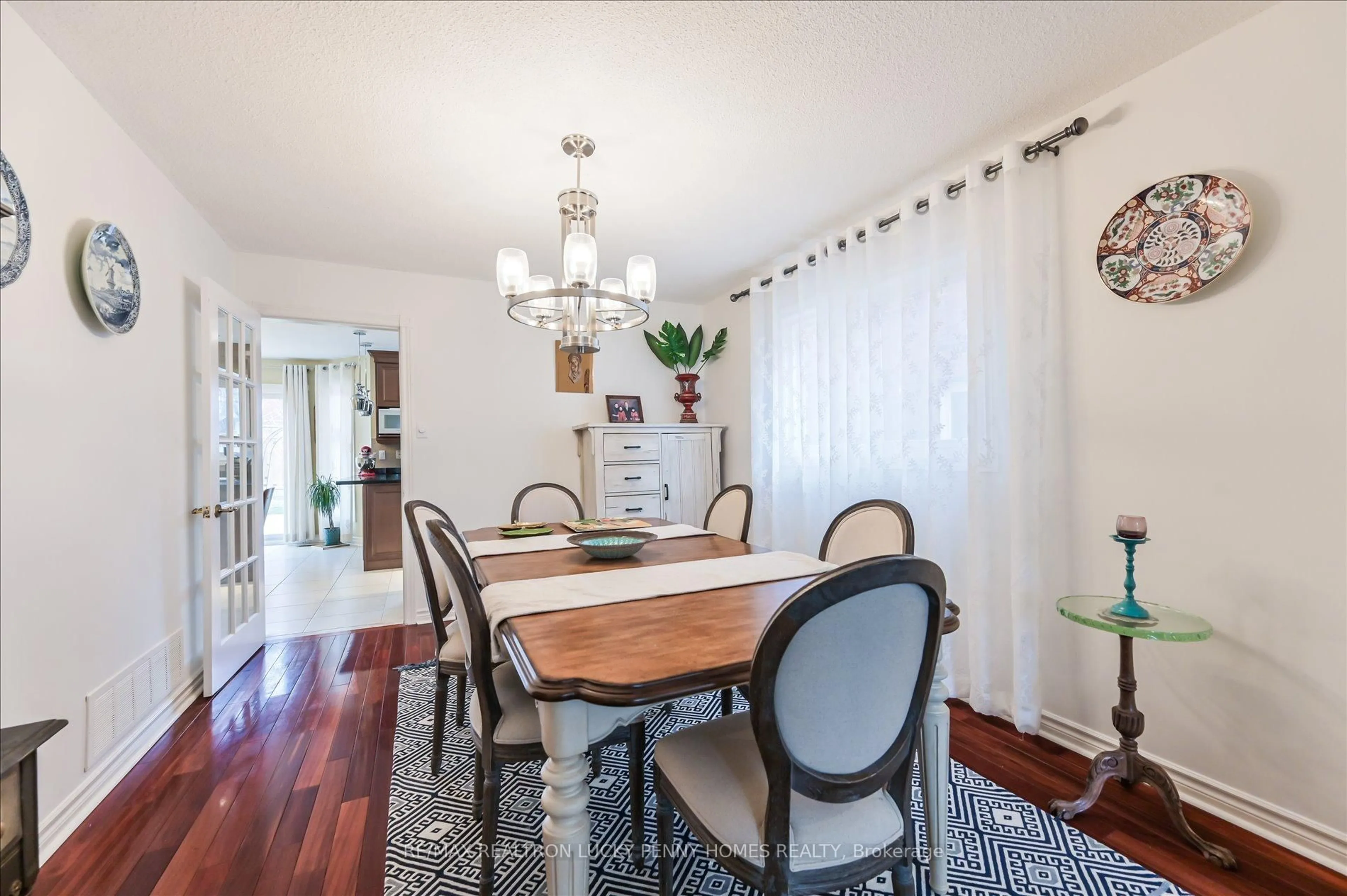 Dining room, wood/laminate floor for 17 Buttonfield Rd, Markham Ontario L3R 9G1