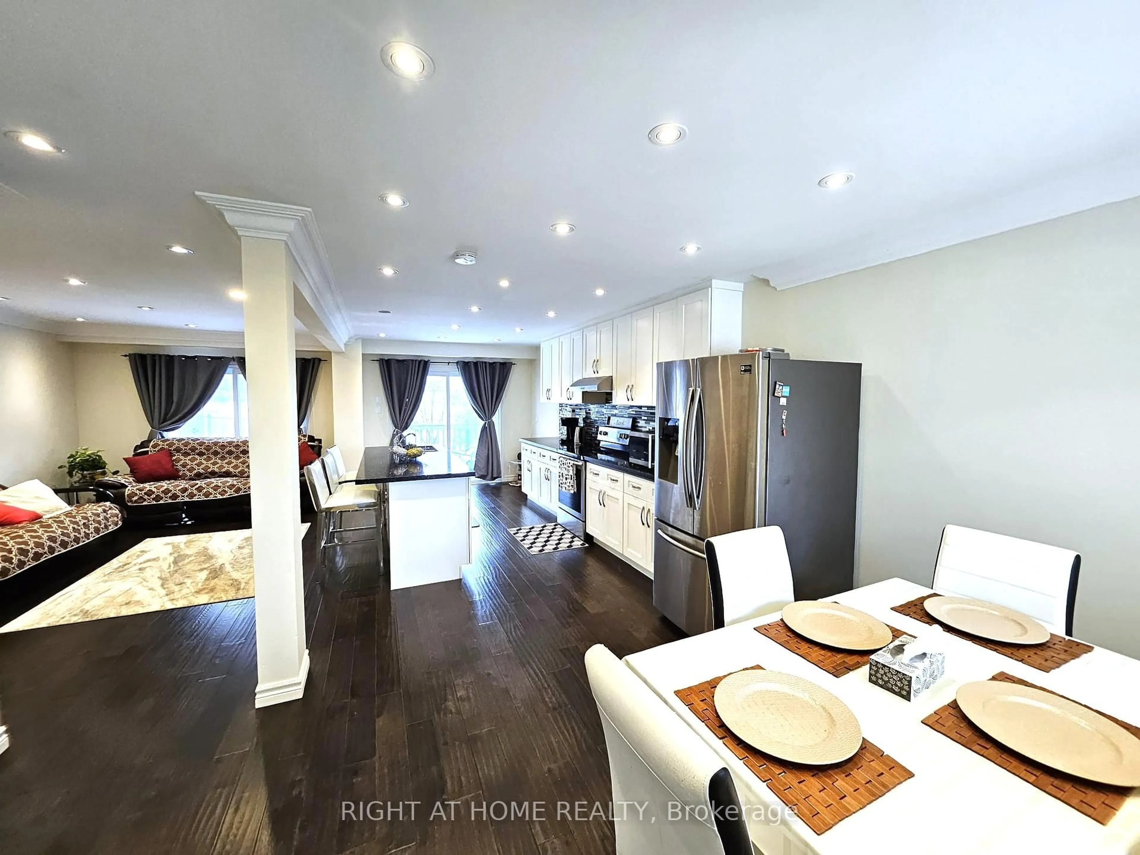 Open concept kitchen, wood/laminate floor for 742 Beman Dr, Newmarket Ontario L3Y 4Z2