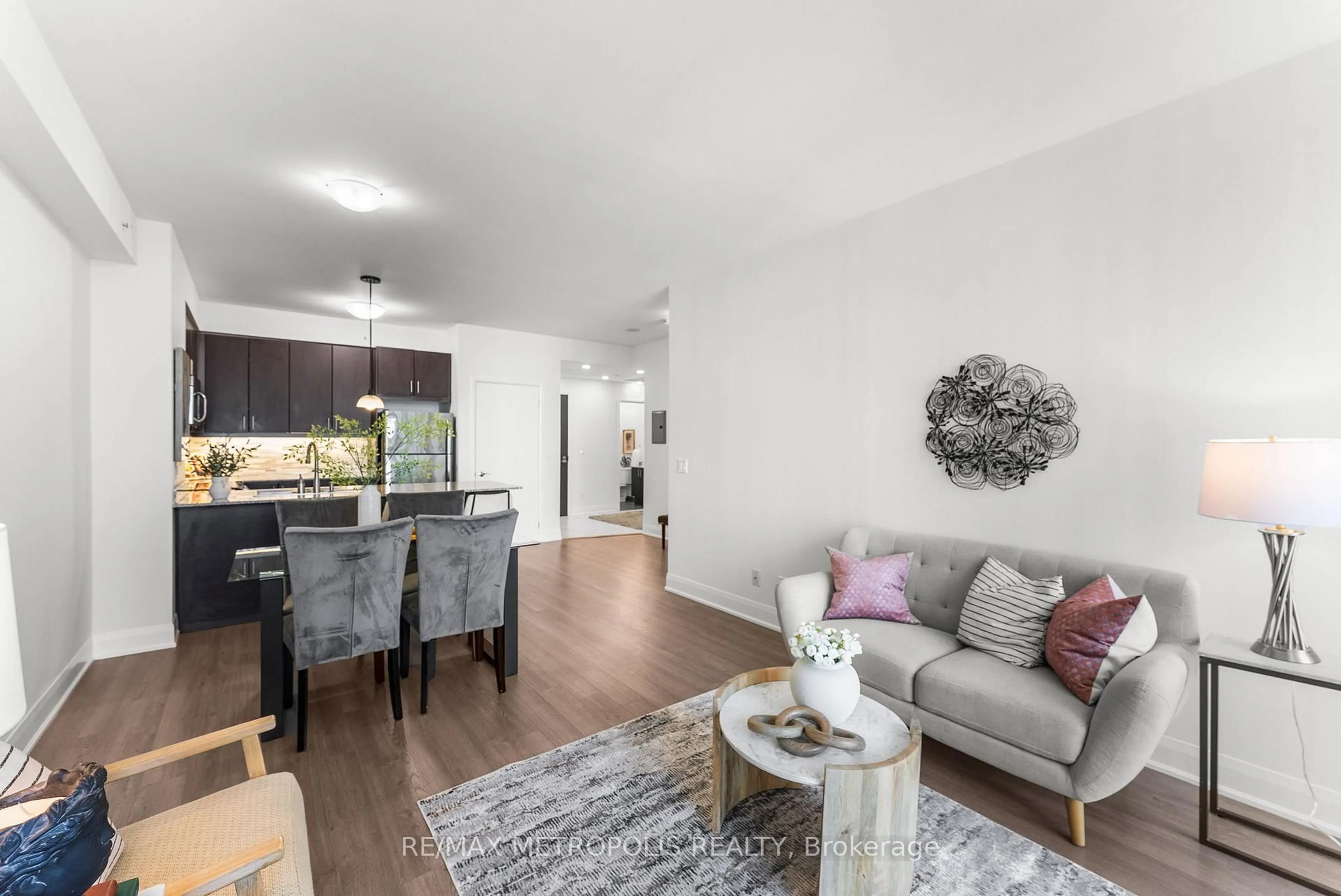 Living room with furniture, wood/laminate floor for 2900 Highway 7 N/A #1706, Vaughan Ontario L4K 0G3