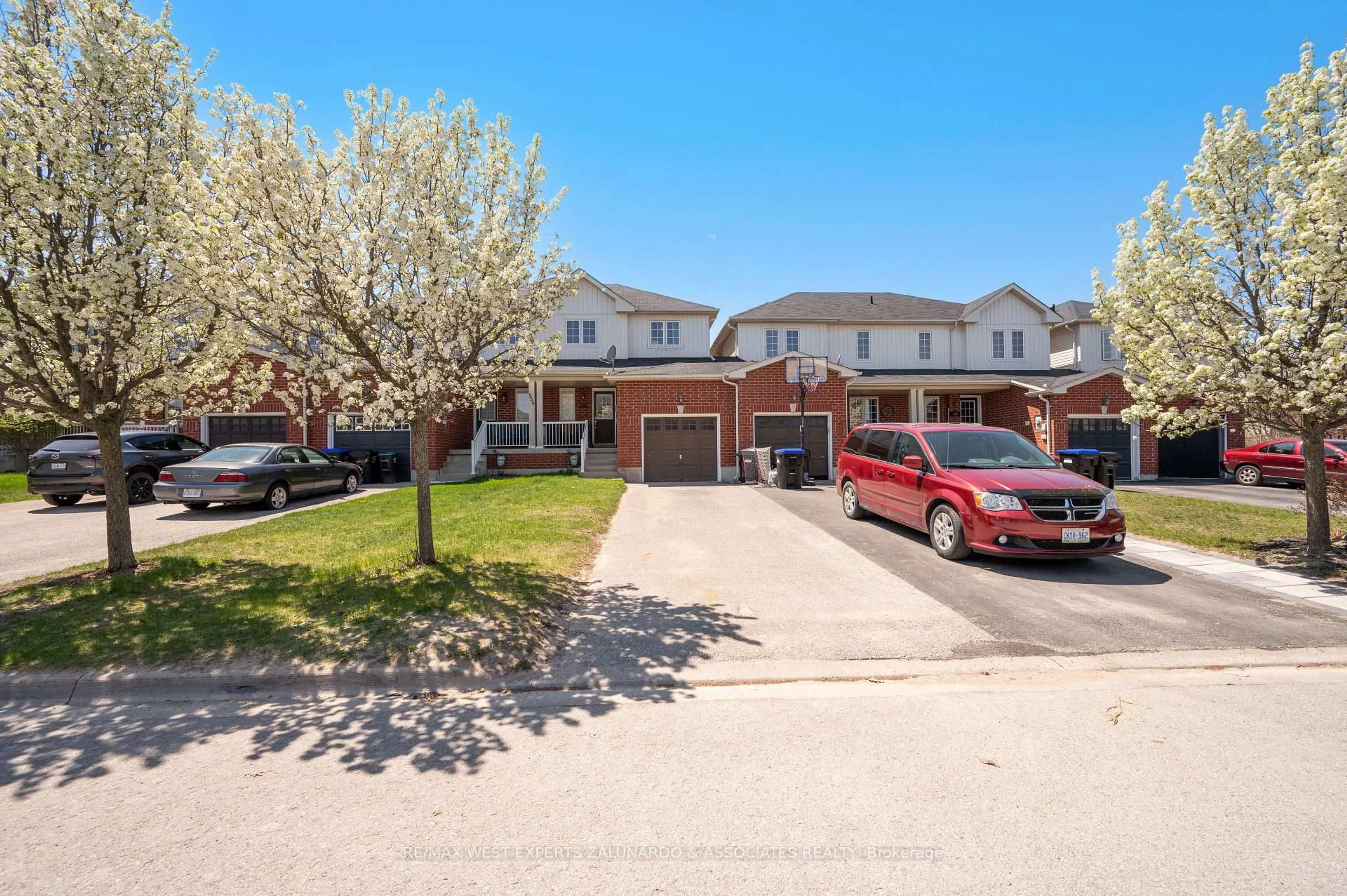 A pic from outside/outdoor area/front of a property/back of a property/a pic from drone, street for 156 Stonemount Cres, Essa Ontario L0M 1B4