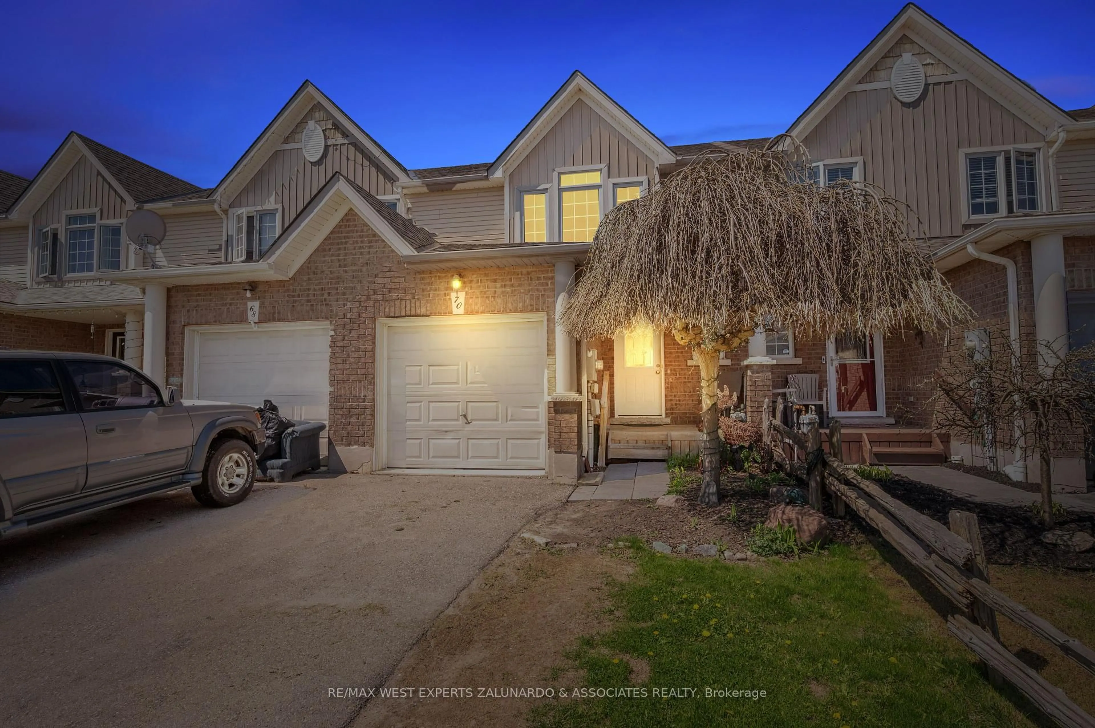 A pic from outside/outdoor area/front of a property/back of a property/a pic from drone, street for 70 Ruthven Cres, New Tecumseth Ontario L9R 0A7