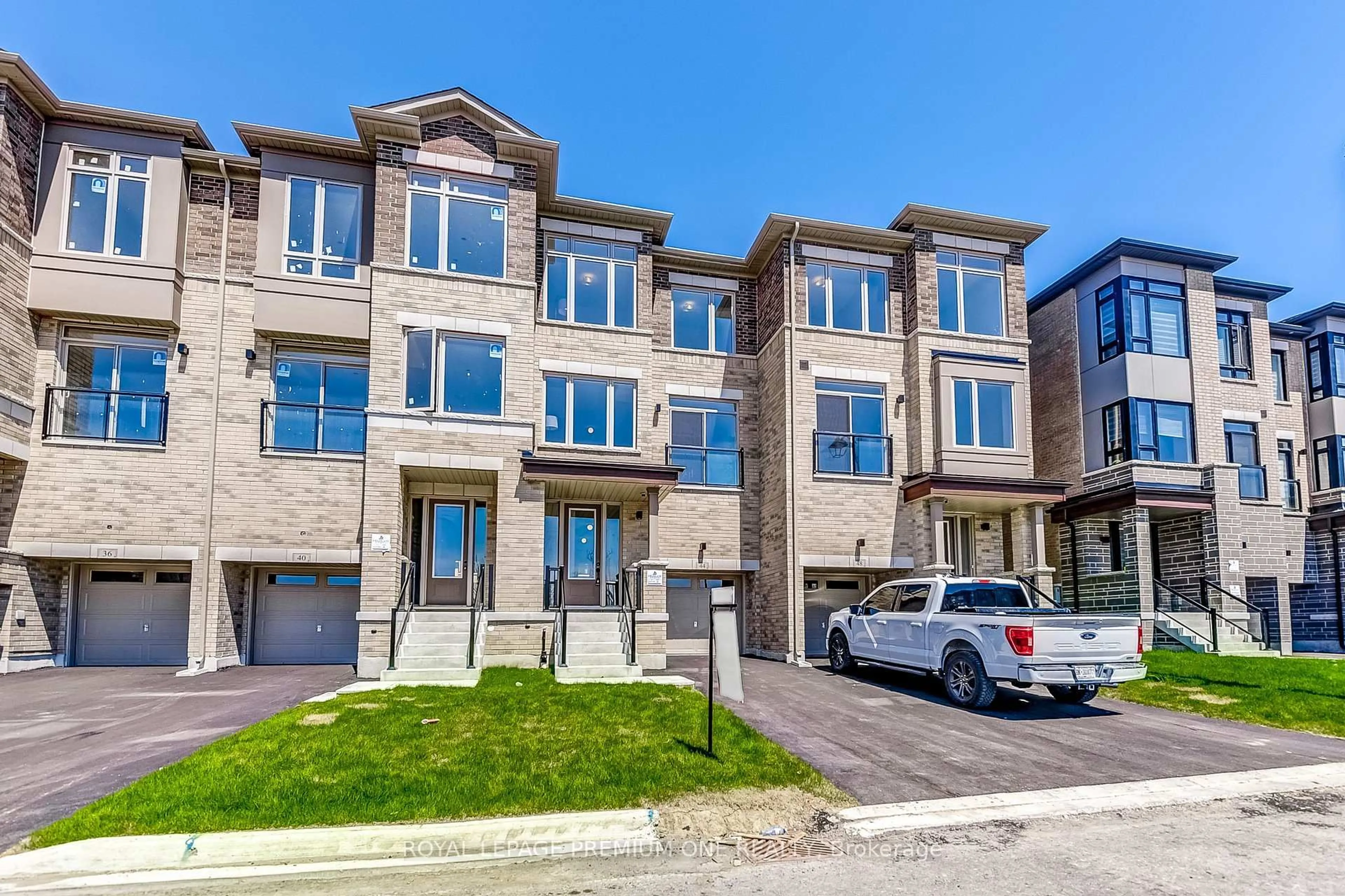 A pic from outside/outdoor area/front of a property/back of a property/a pic from drone, street for 44 Tennant Circ, Vaughan Ontario L4H 5L4