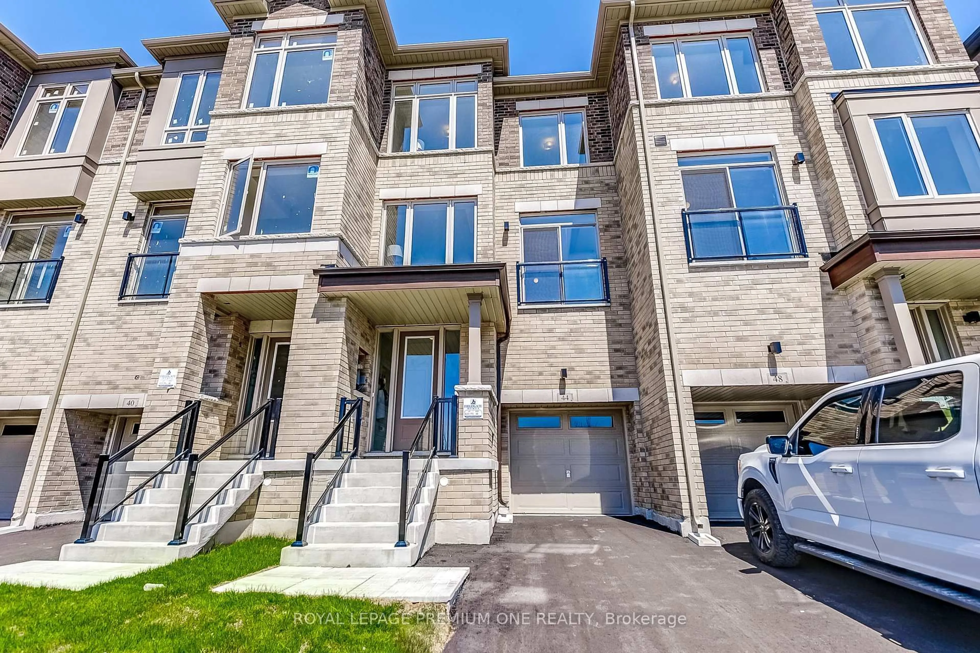 Home with brick exterior material, street for 44 Tennant Circ, Vaughan Ontario L4H 5L4