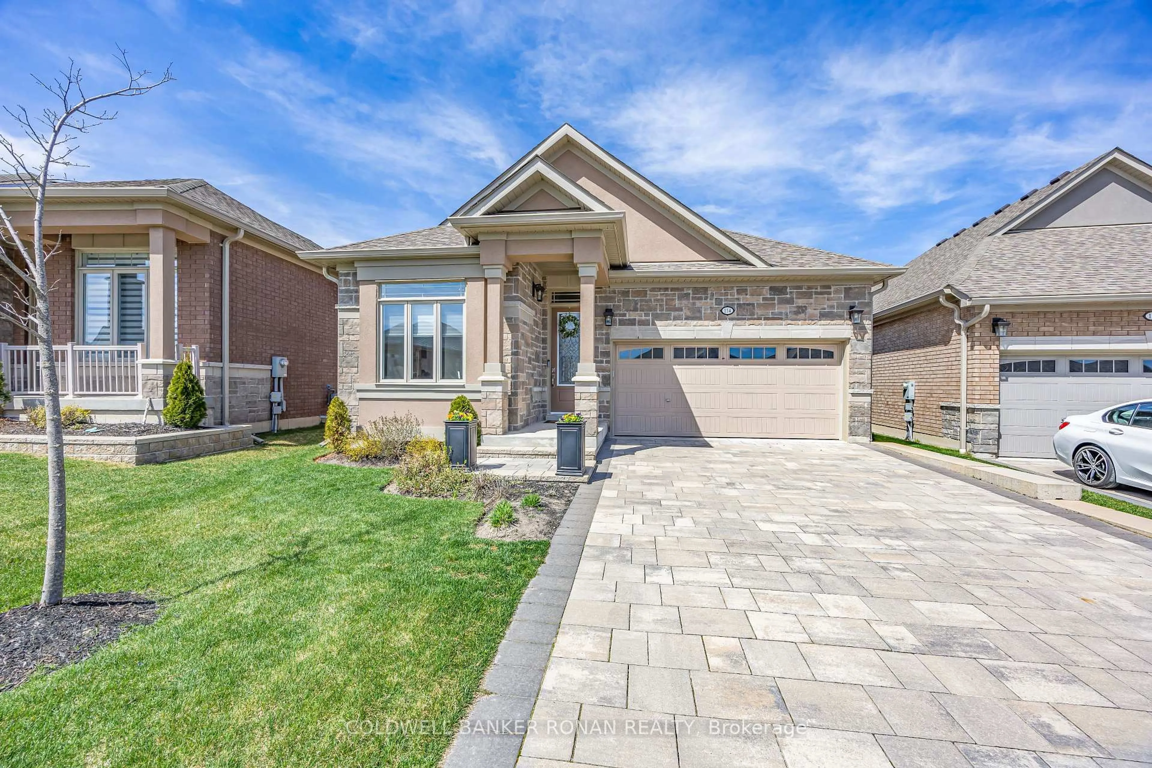 Home with brick exterior material, street for 114 Summerhill Dr #20, New Tecumseth Ontario L9R 0W6
