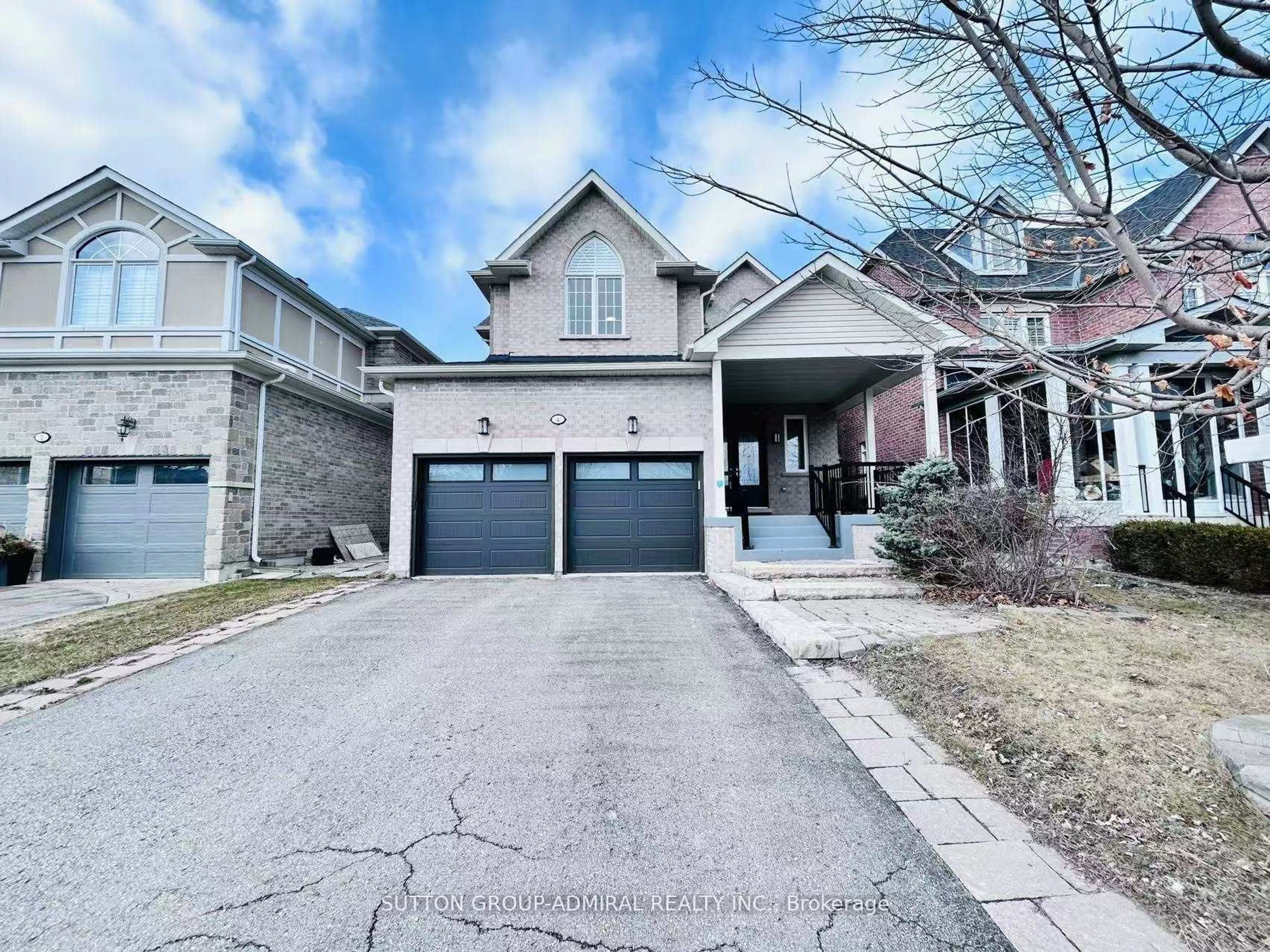 Home with brick exterior material, street for 4 Castleglen Blvd, Markham Ontario L6C 0A8