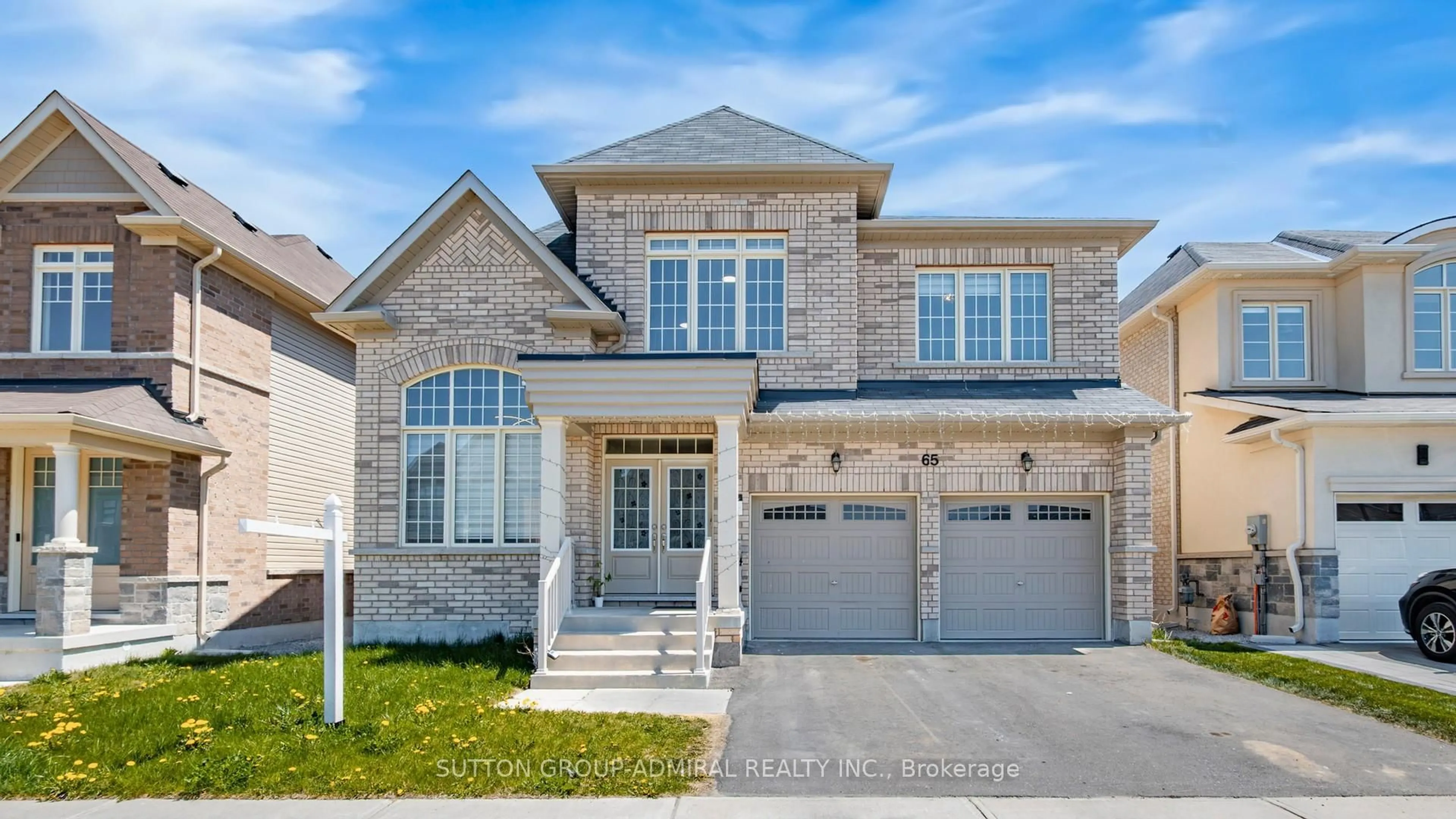Home with brick exterior material, street for 65 Strathgreen Lane, Georgina Ontario L4P 0E9