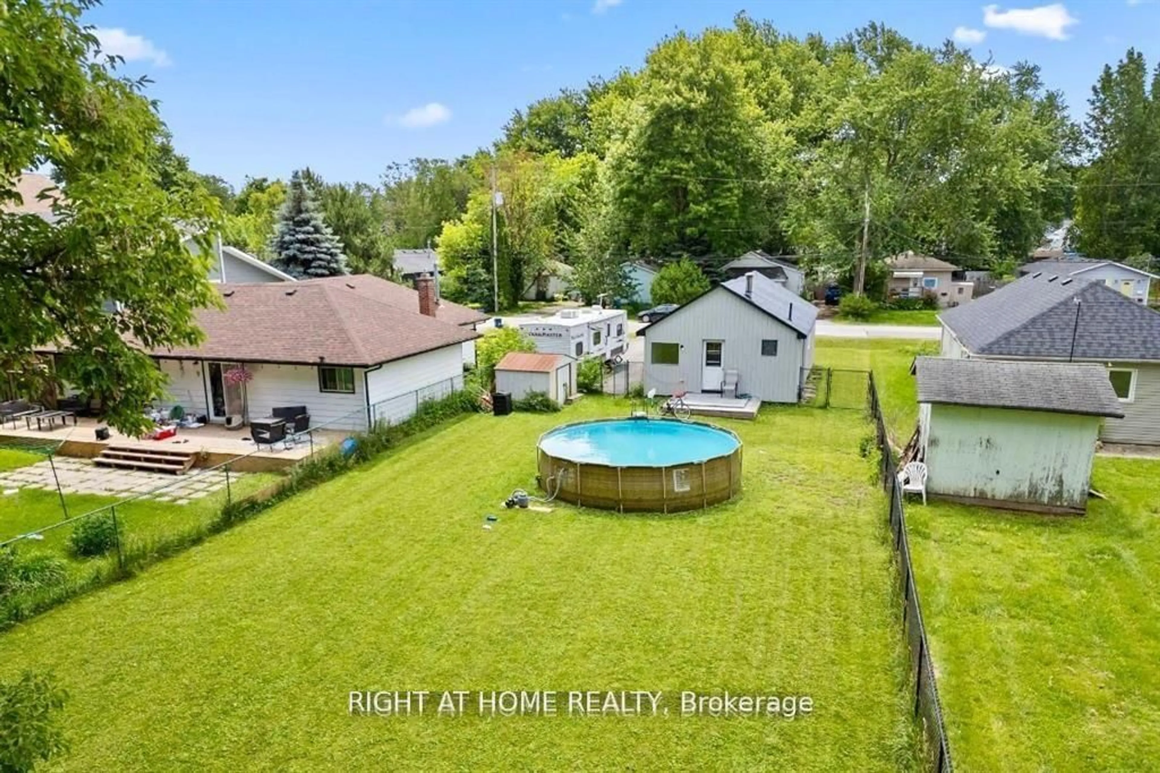 A pic from outside/outdoor area/front of a property/back of a property/a pic from drone, water/lake/river/ocean view for 208 Bayview Ave, Georgina Ontario L4P 2T2
