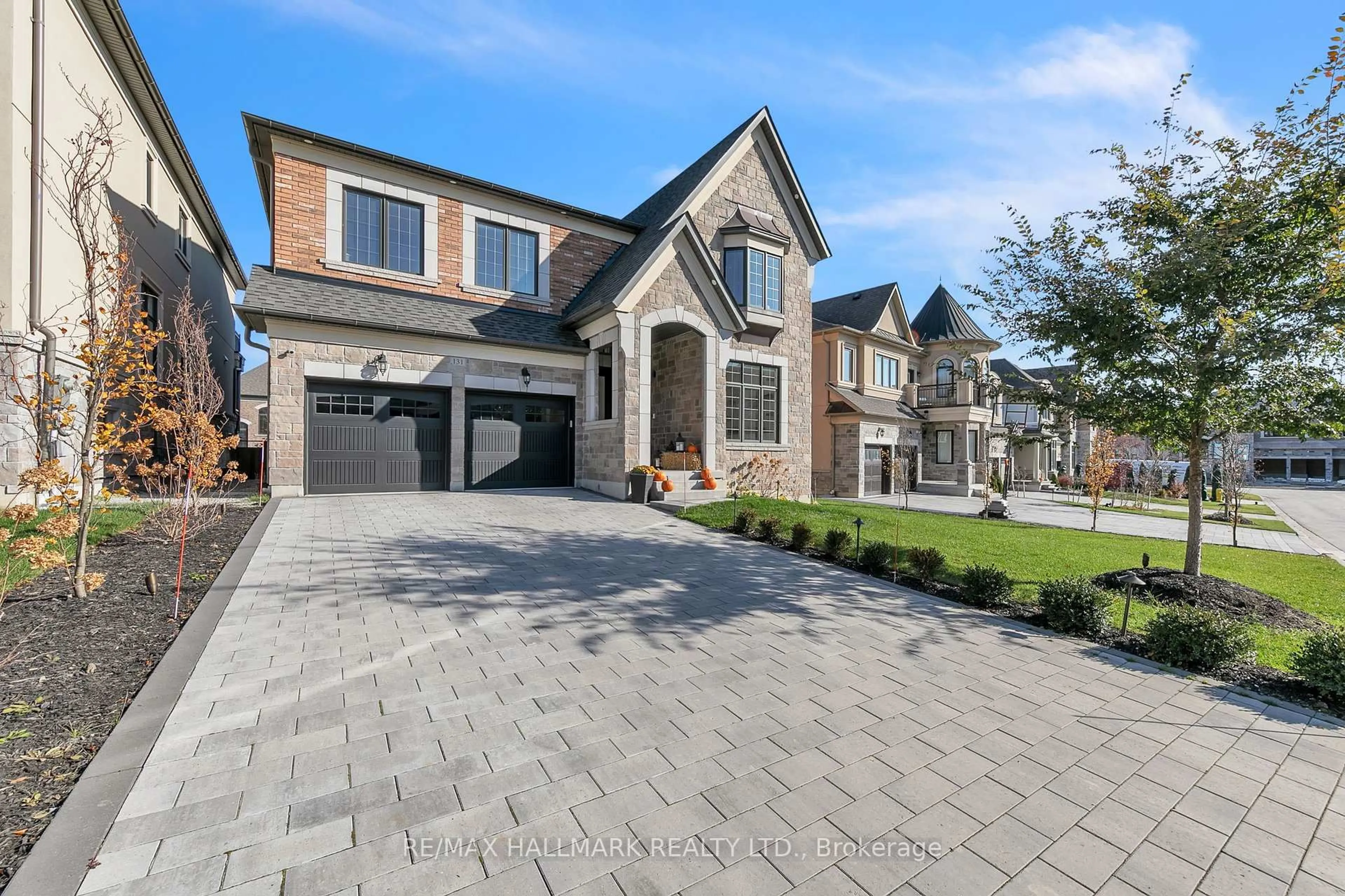Home with brick exterior material, street for 131 Lady Jessica Dr, Vaughan Ontario L6A 4Z7