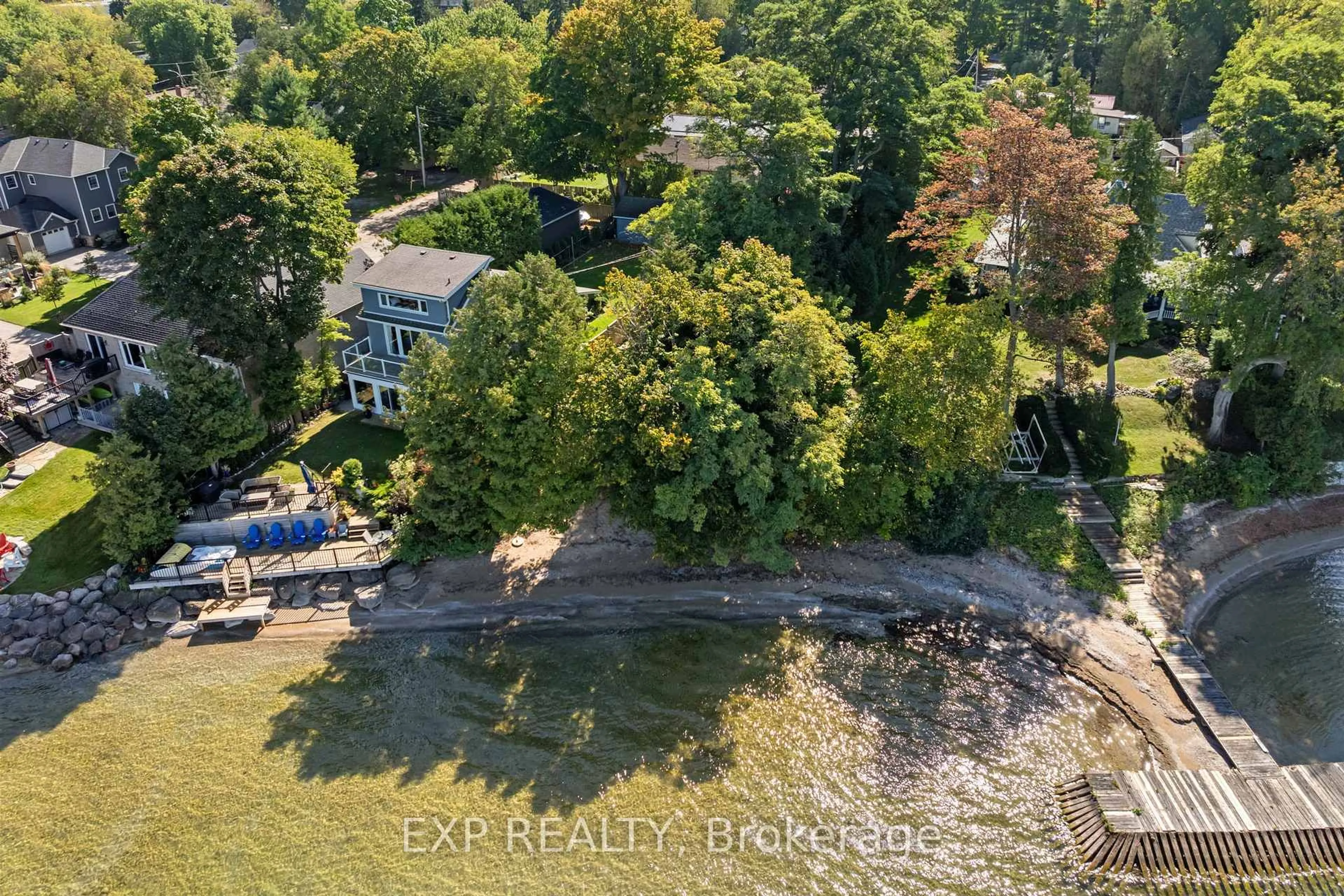 A pic from outside/outdoor area/front of a property/back of a property/a pic from drone, water/lake/river/ocean view for 9 Riley Ave, Georgina Ontario L0E 1L0