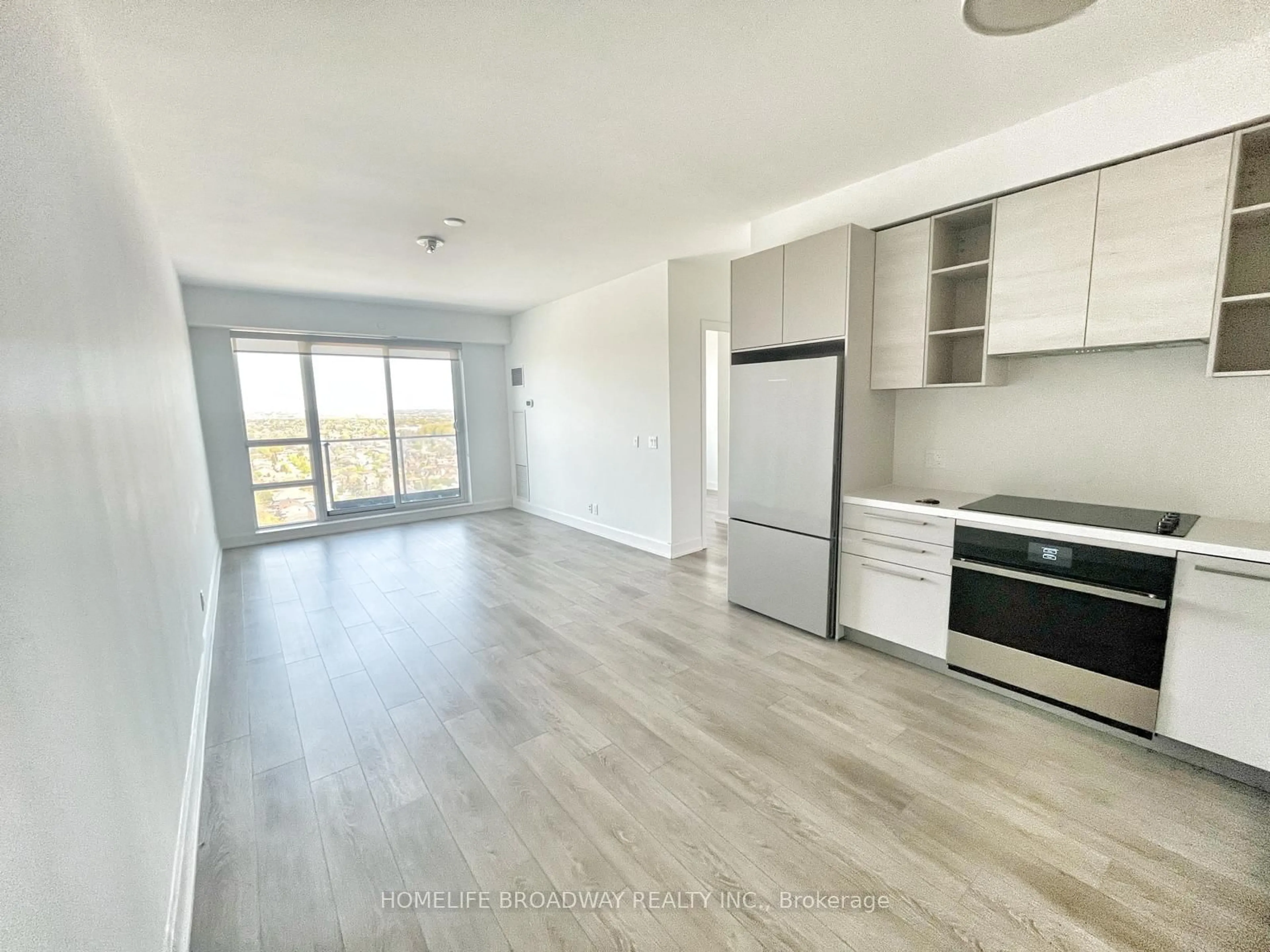 Open concept kitchen, wood/laminate floor for 38 Gandhi Lane #2302, Markham Ontario L3T 0G9