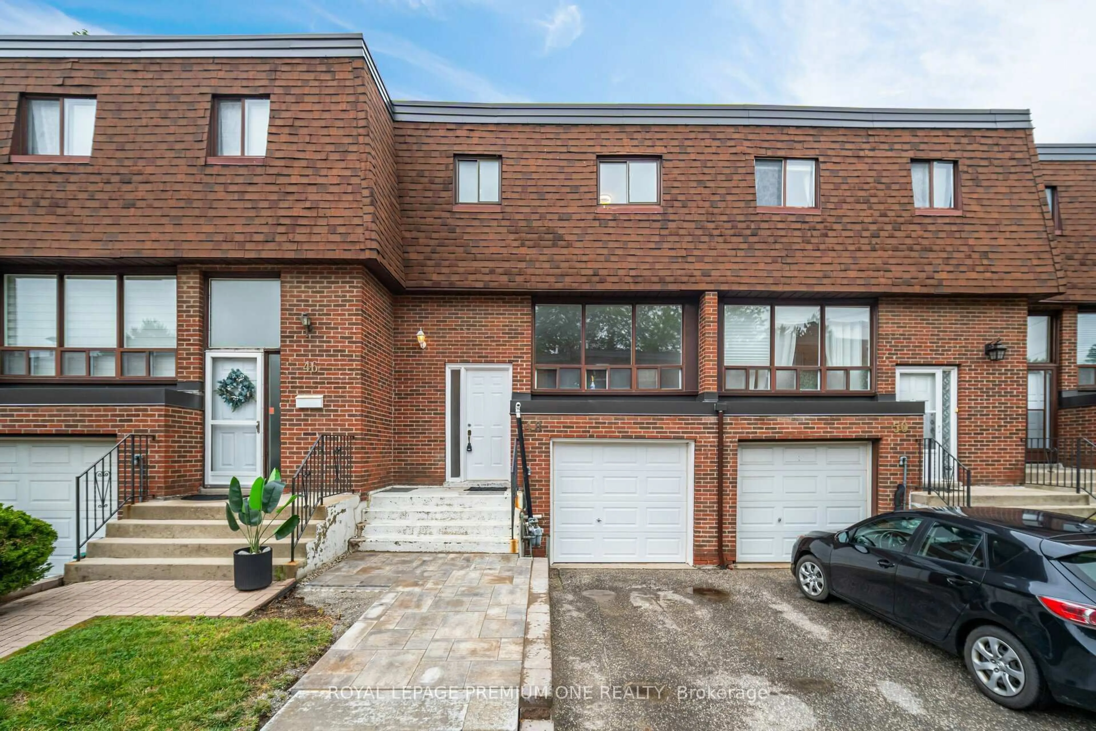 Home with brick exterior material, street for 48 Stately Way #24, Markham Ontario L3T 3Z8