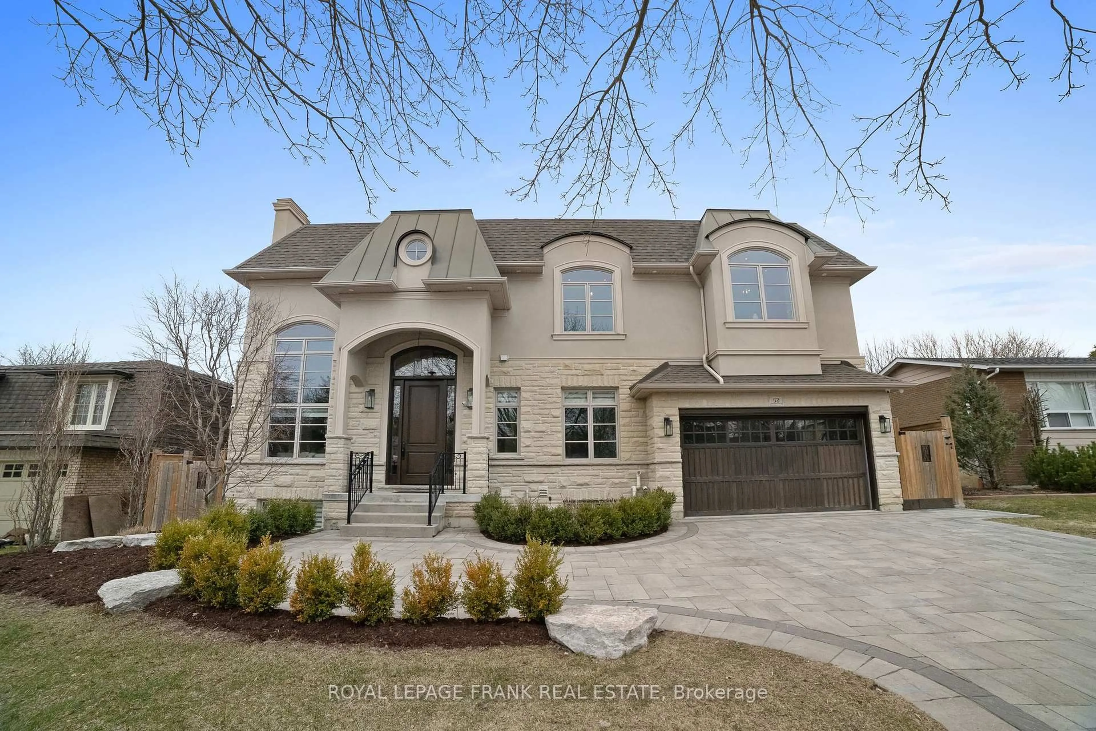 Home with brick exterior material, street for 52 Wootten Way, Markham Ontario L3P 2Y4