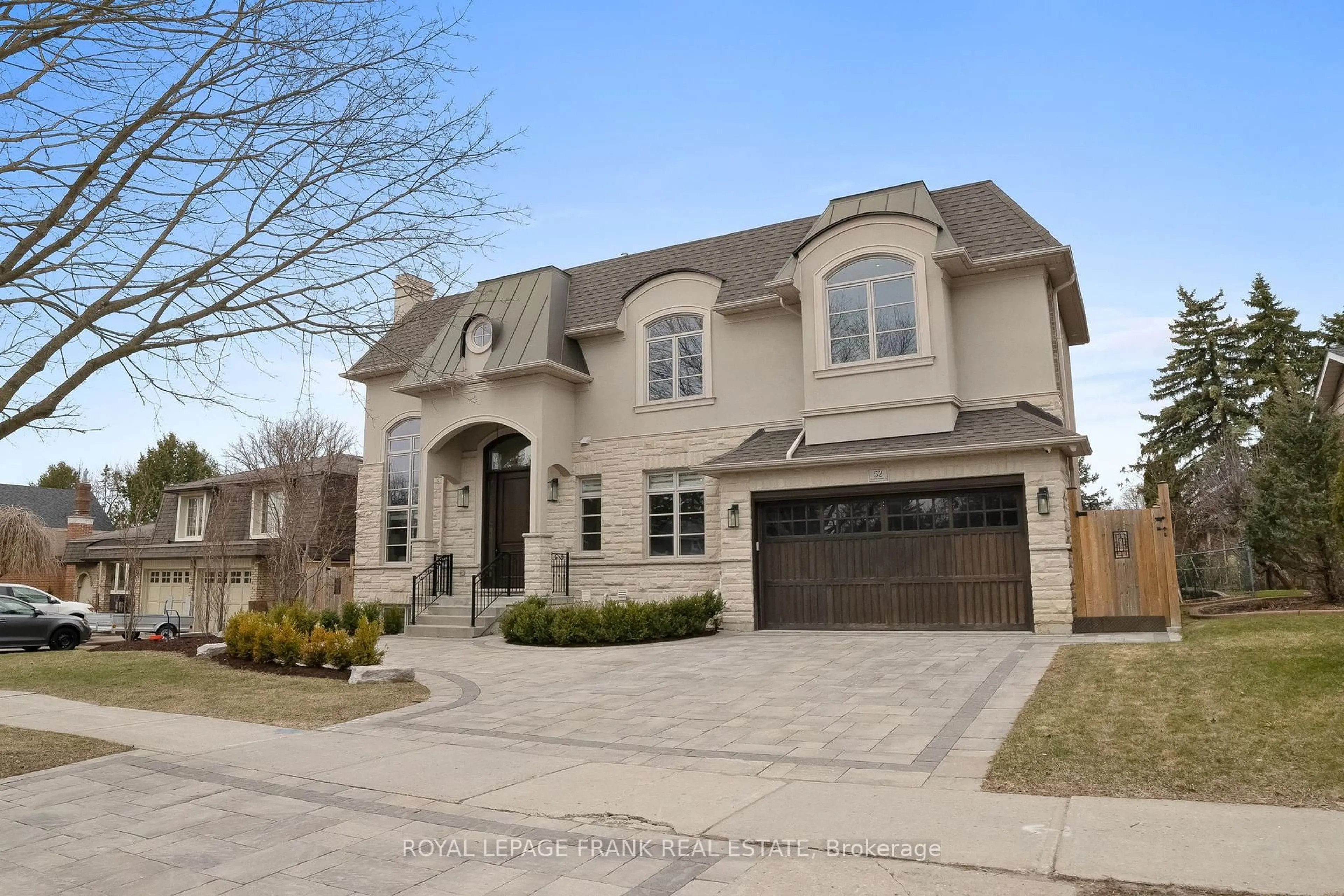 Home with brick exterior material, street for 52 Wootten Way, Markham Ontario L3P 2Y4