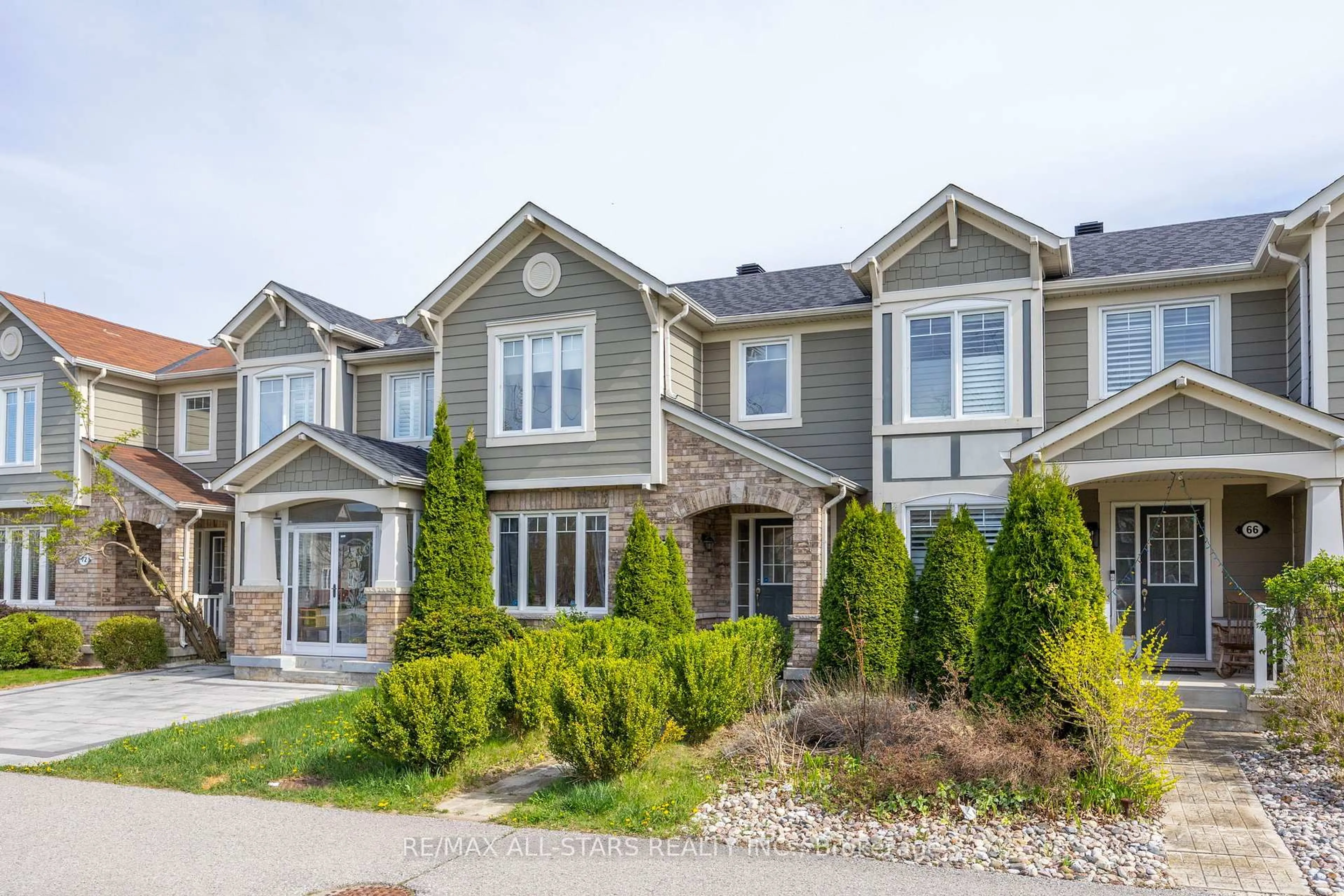 Home with brick exterior material, street for 68 Gas Lamp Lane, Markham Ontario L6B 0H7