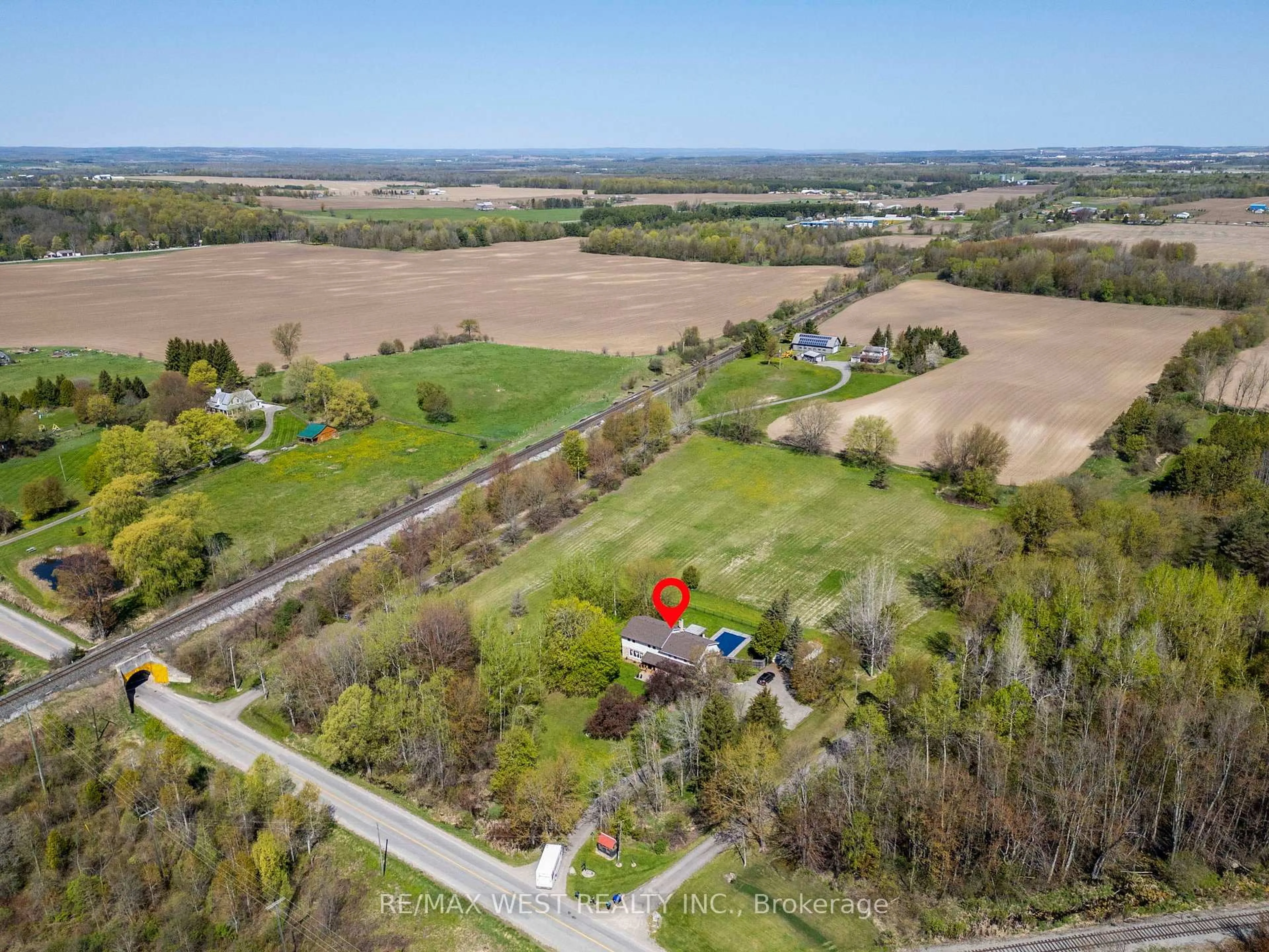 A pic from outside/outdoor area/front of a property/back of a property/a pic from drone, unknown for 6492 7th Line, New Tecumseth Ontario L0G 1A0